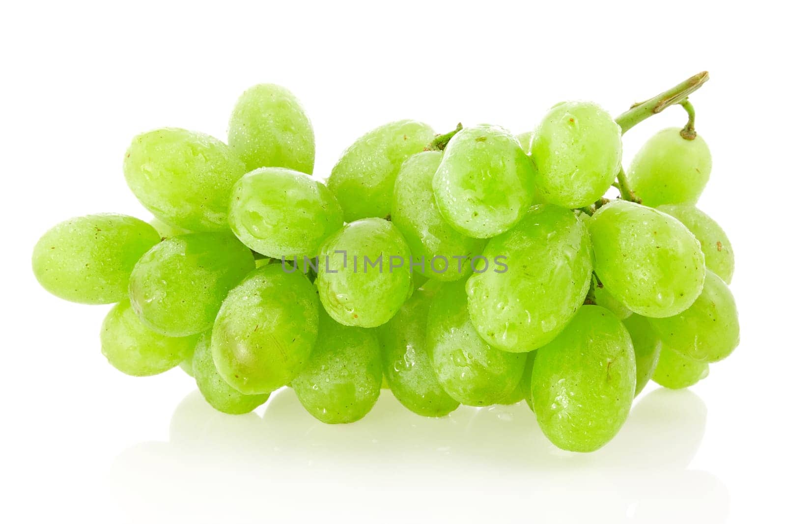 Fresh green grapes over a white background