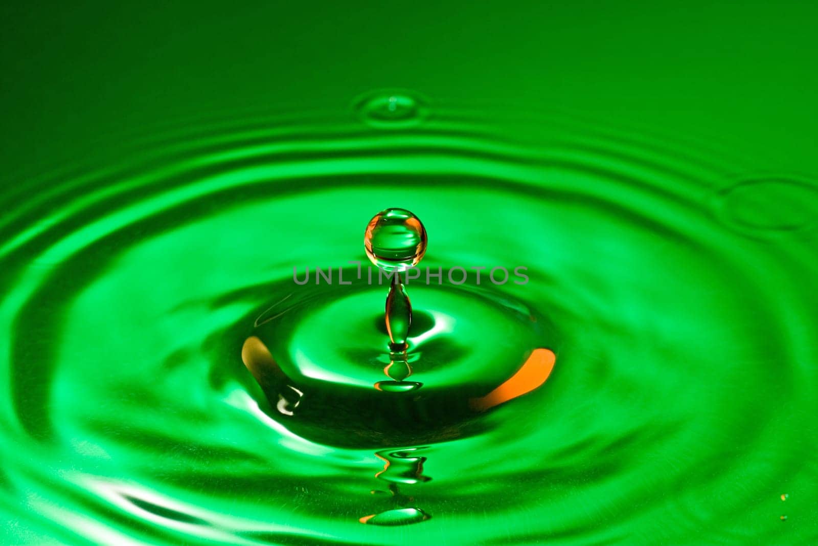 tranquility conceptual. perfect droplet splash in a water