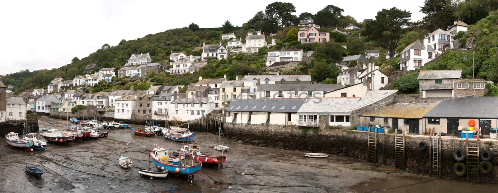 overview of Polperro with boats aground in Cornwall