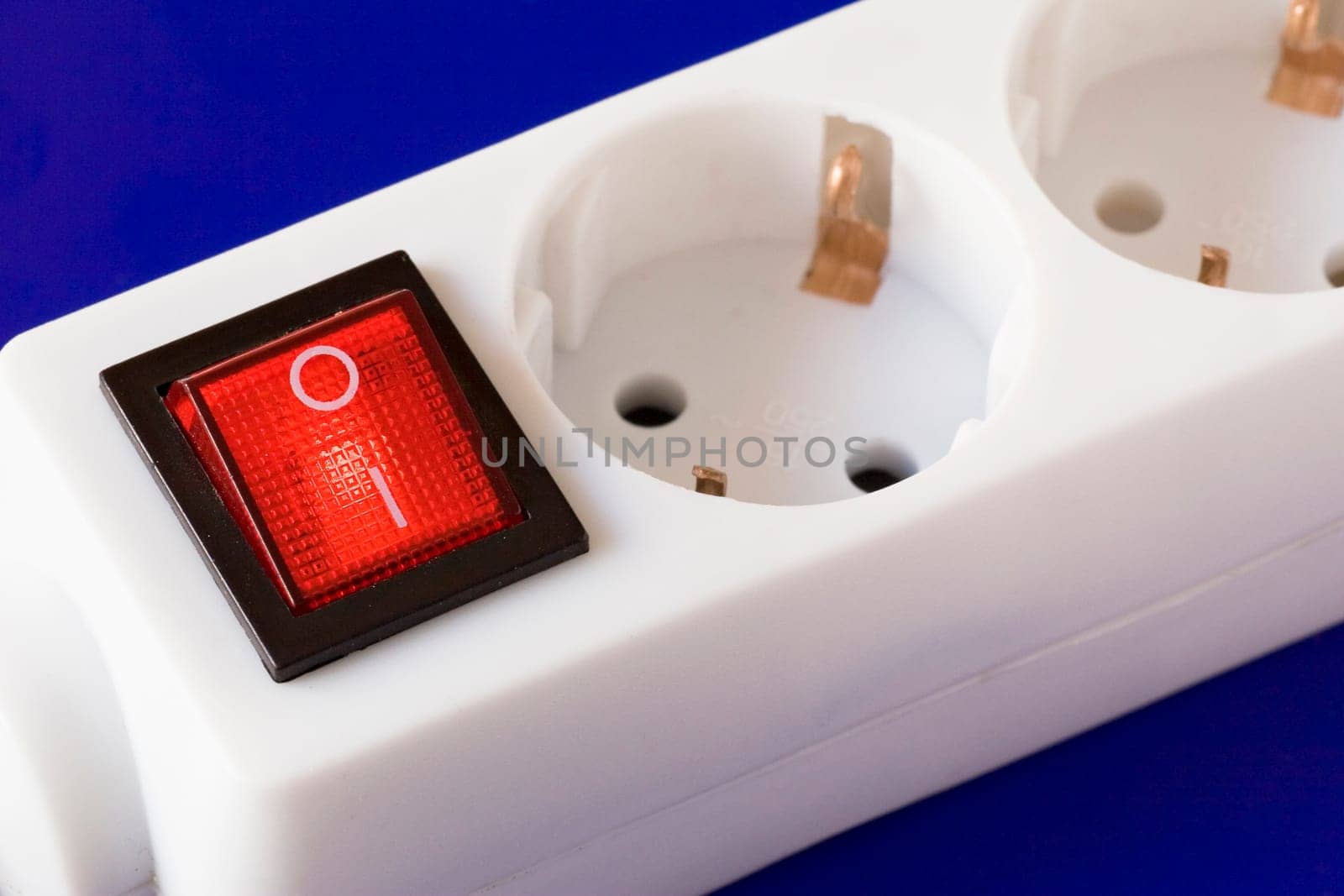 electric extension cord with red switch button