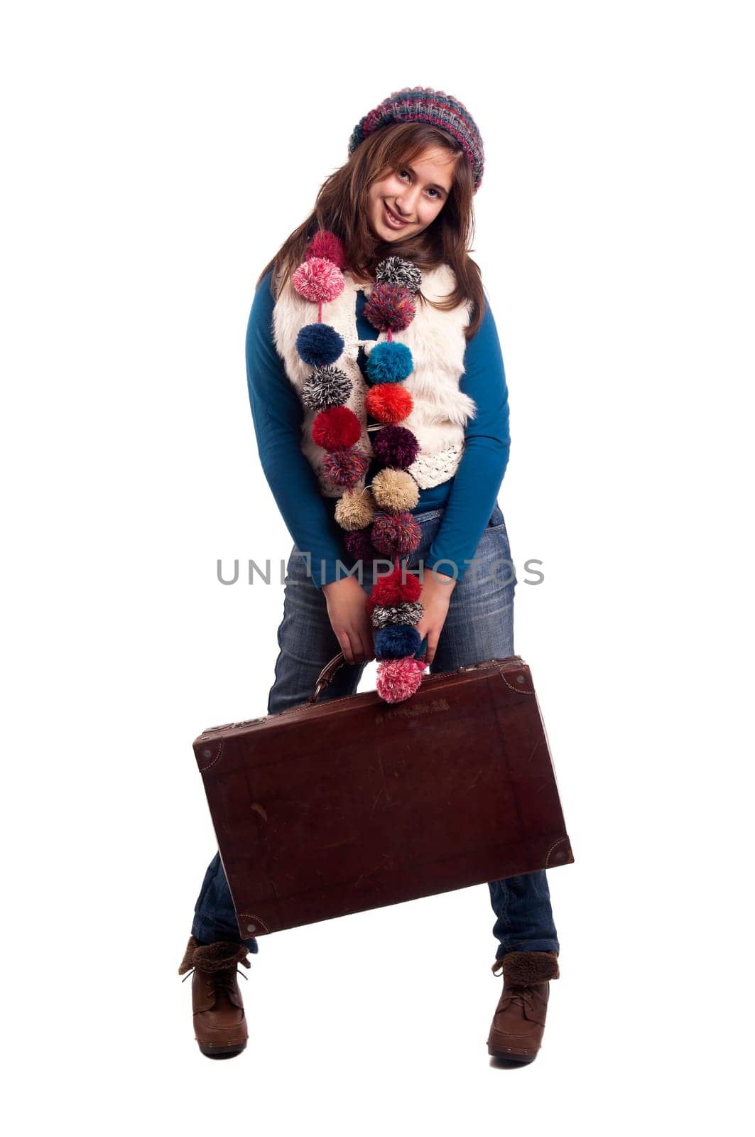 Beautiful young girl posing with case isolated in white