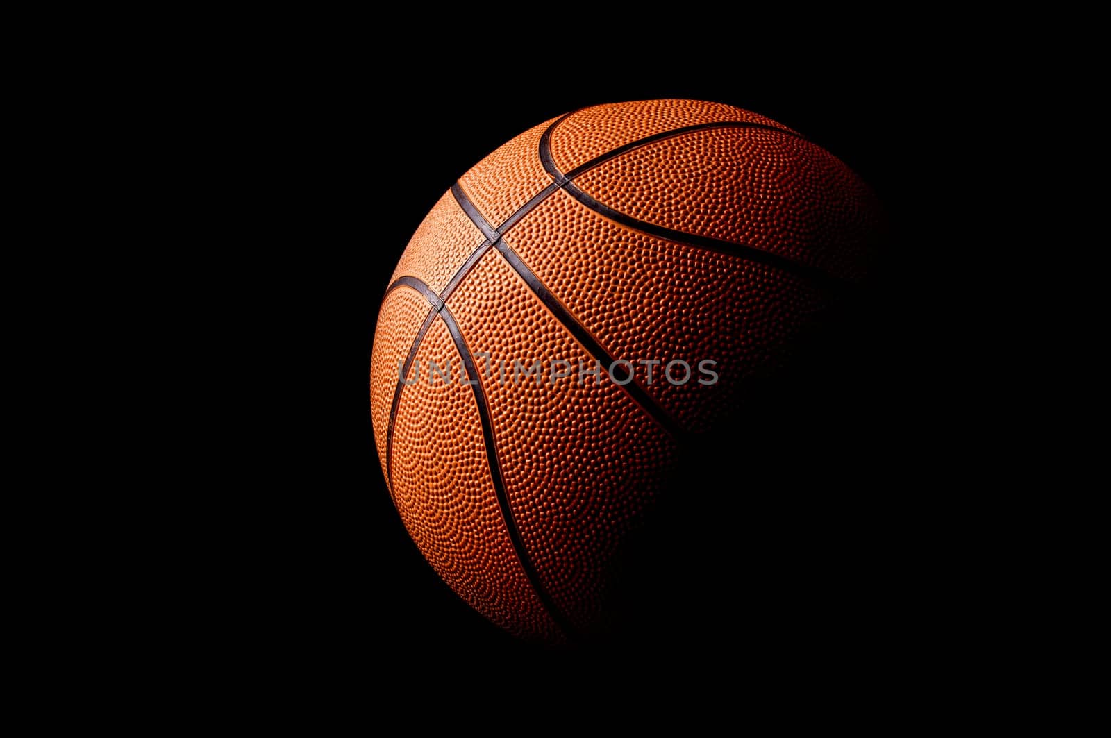 Basket ball in a dark background