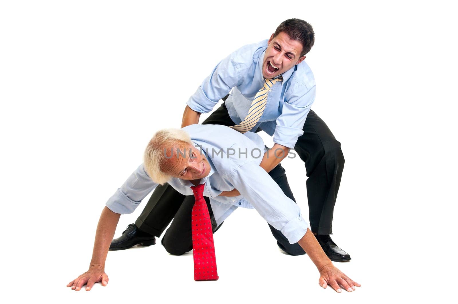 To businessmen wrestling isolated against a white background