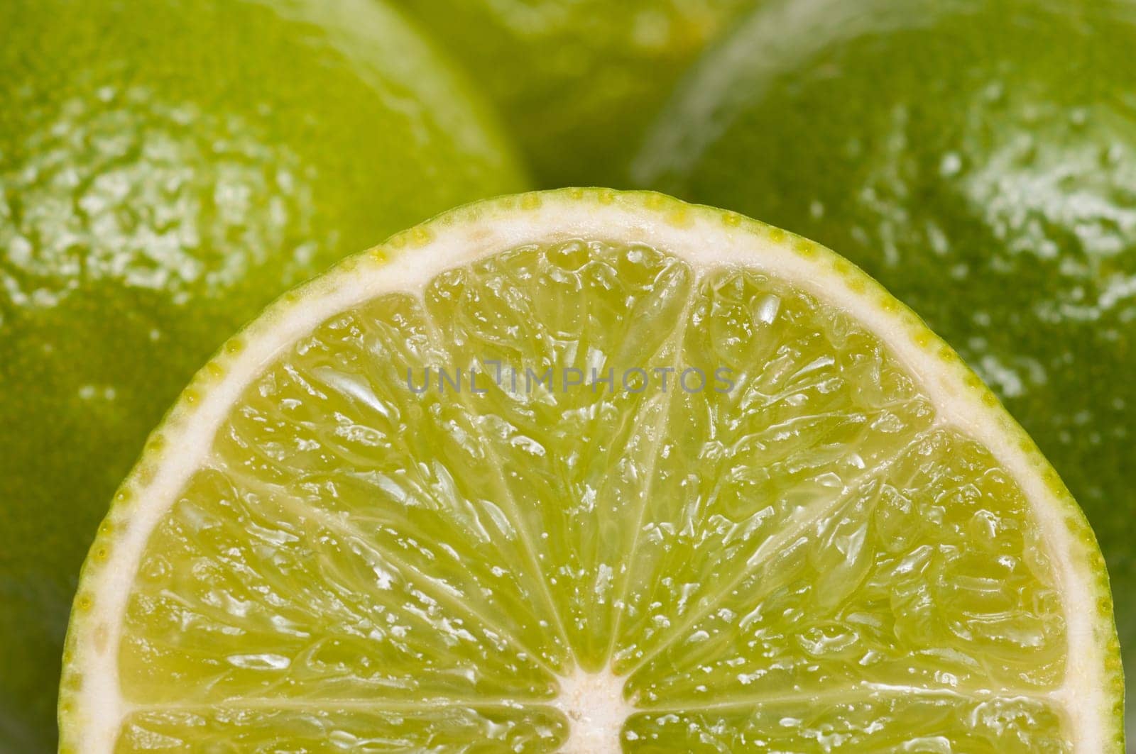 Close-up of a sliced green lime