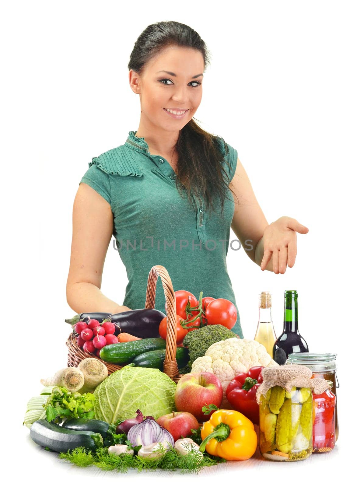 Young woman with variety of food products isolated on white