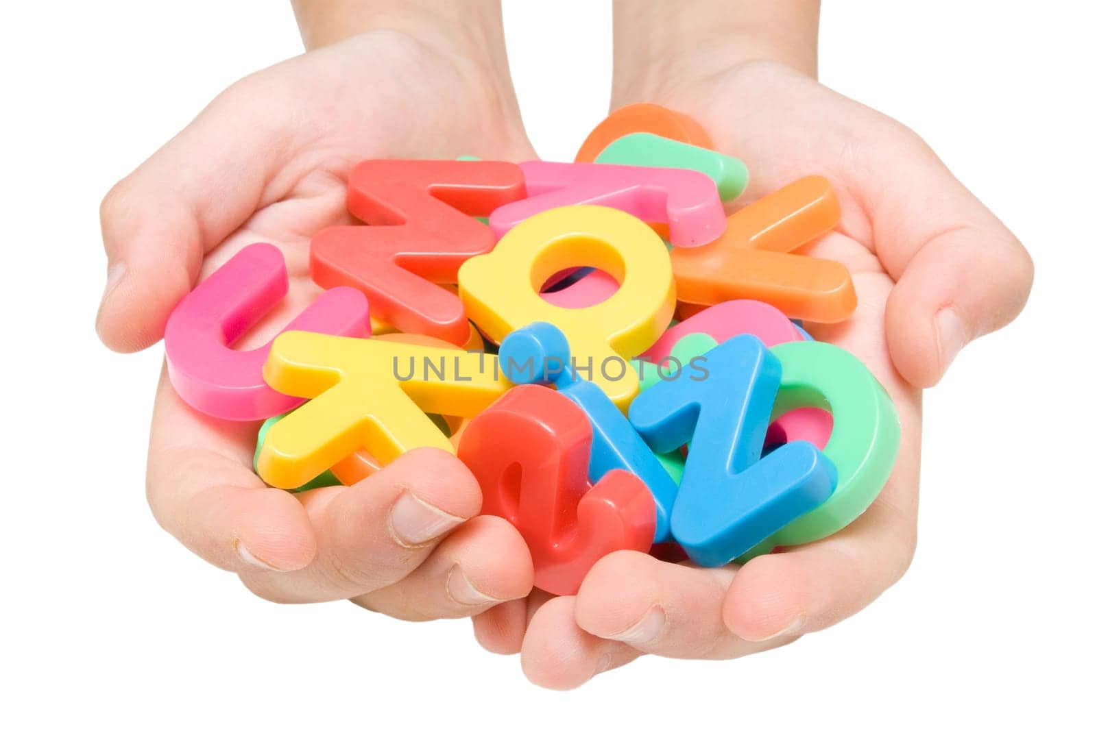 child hands with color alphabet . isolated on white.