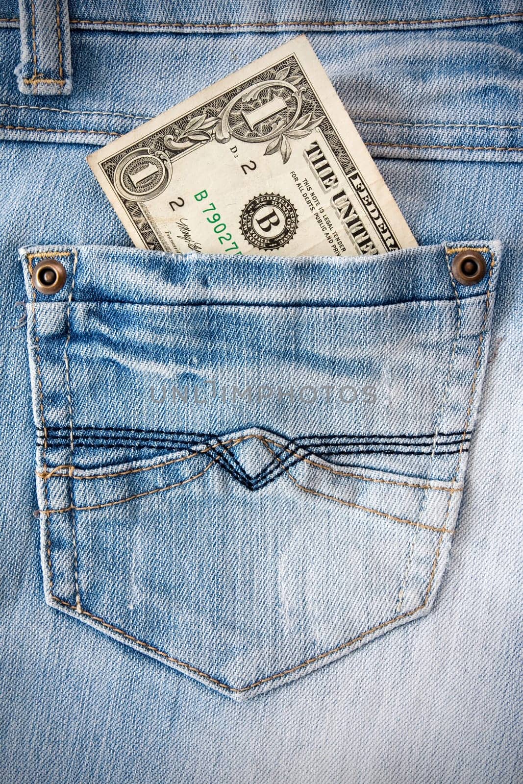 one dollar in the blue jeans pocket