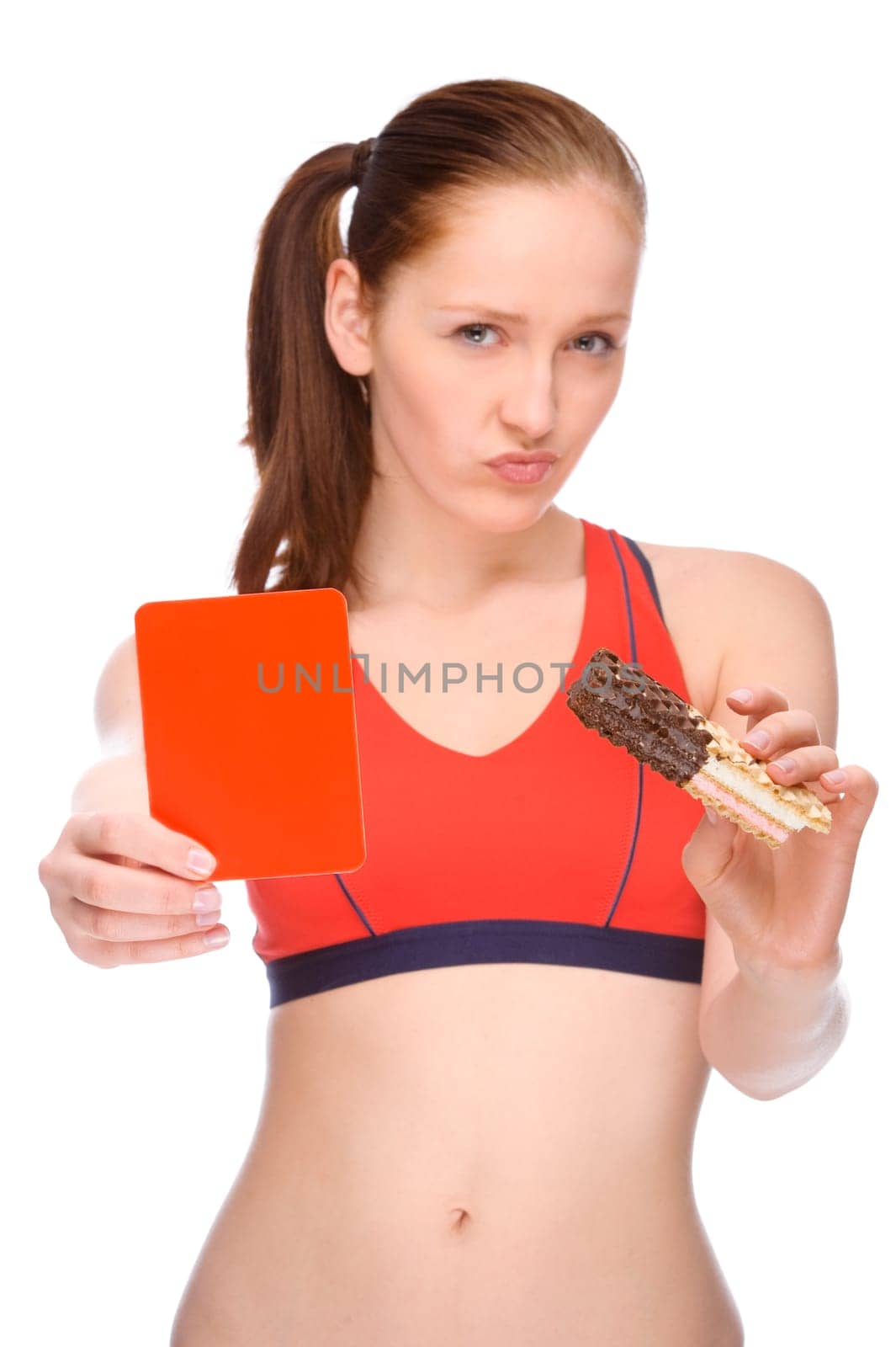 Studio shot of young woman with waffle and red card
