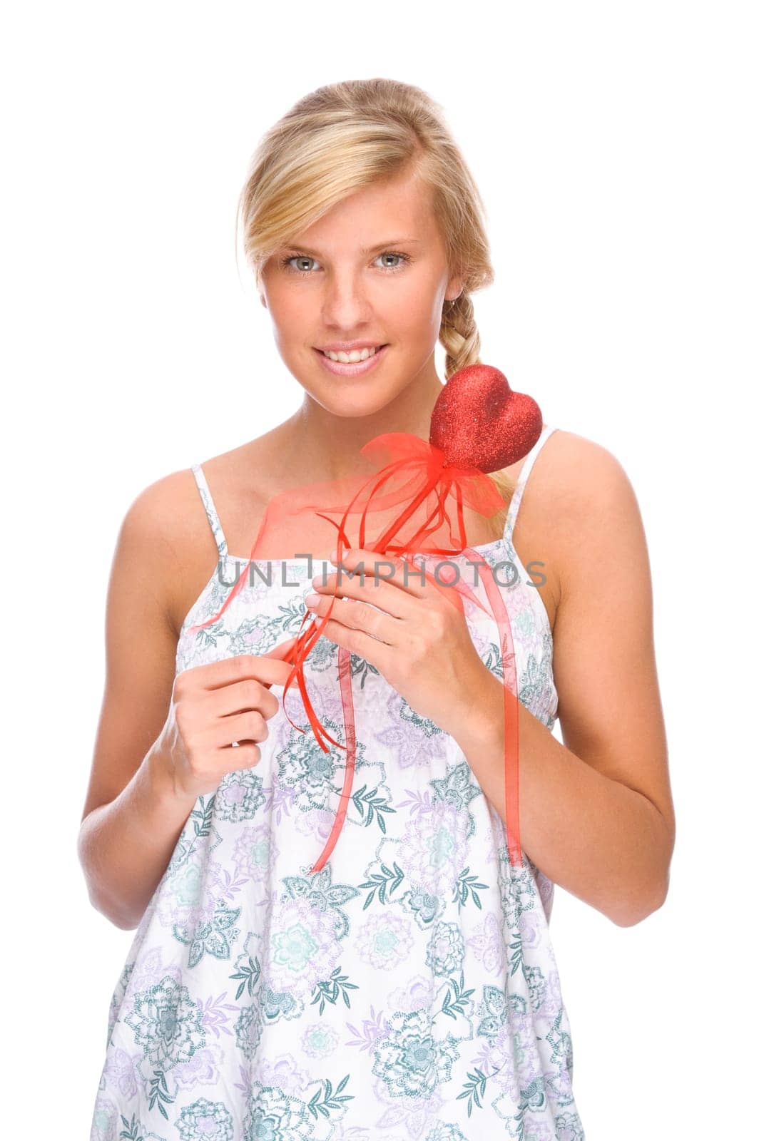 Studio shot of a young woman with a heart