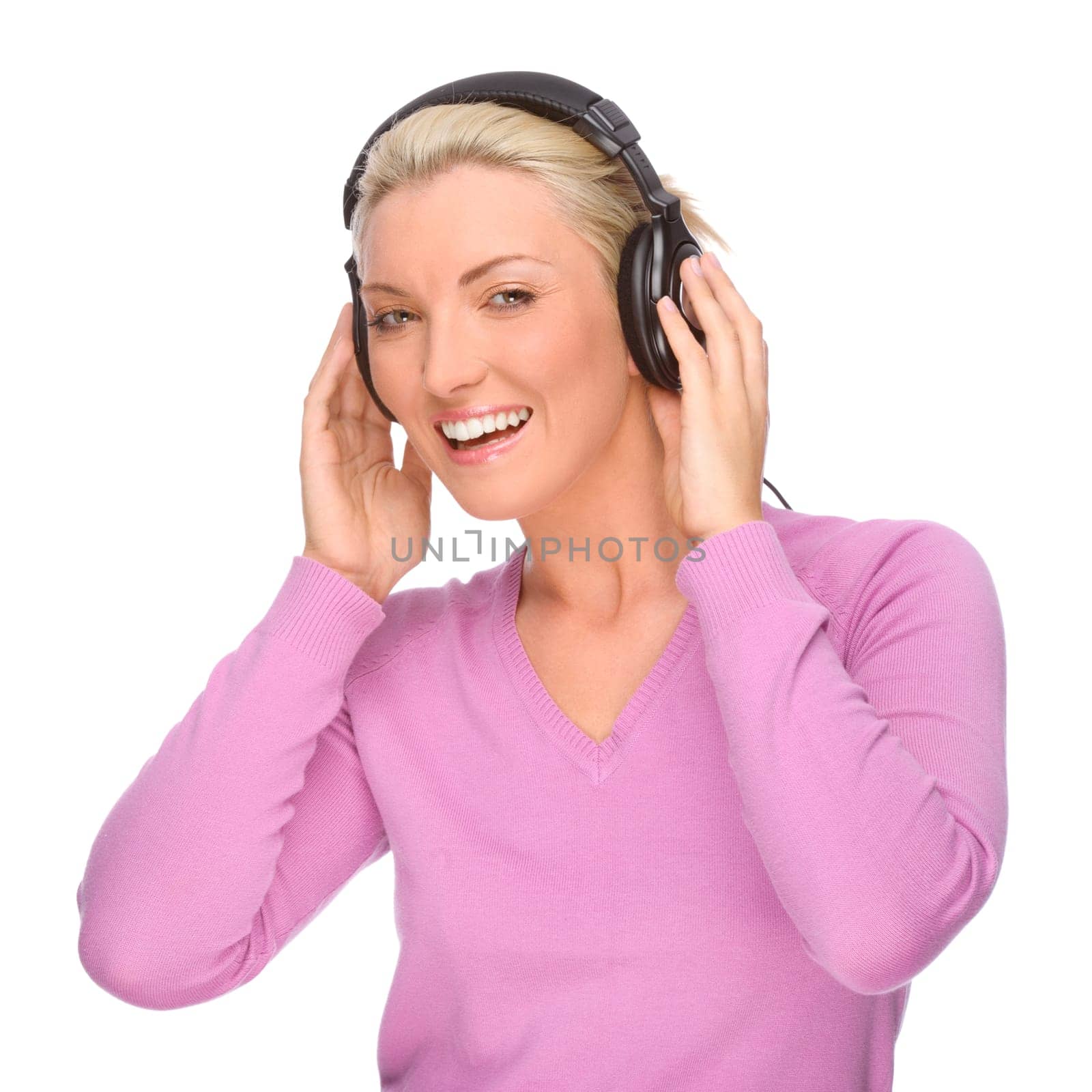 Studio shot of a young woman wearing headphones