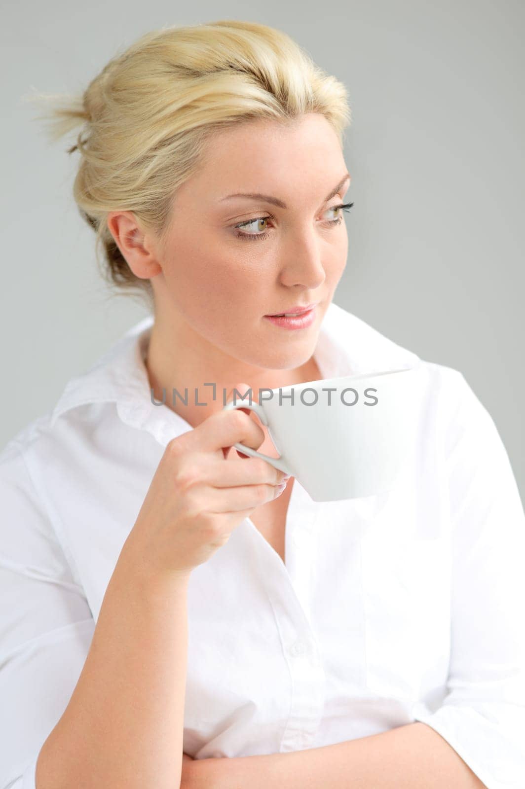 Young woman with a cup of coffee