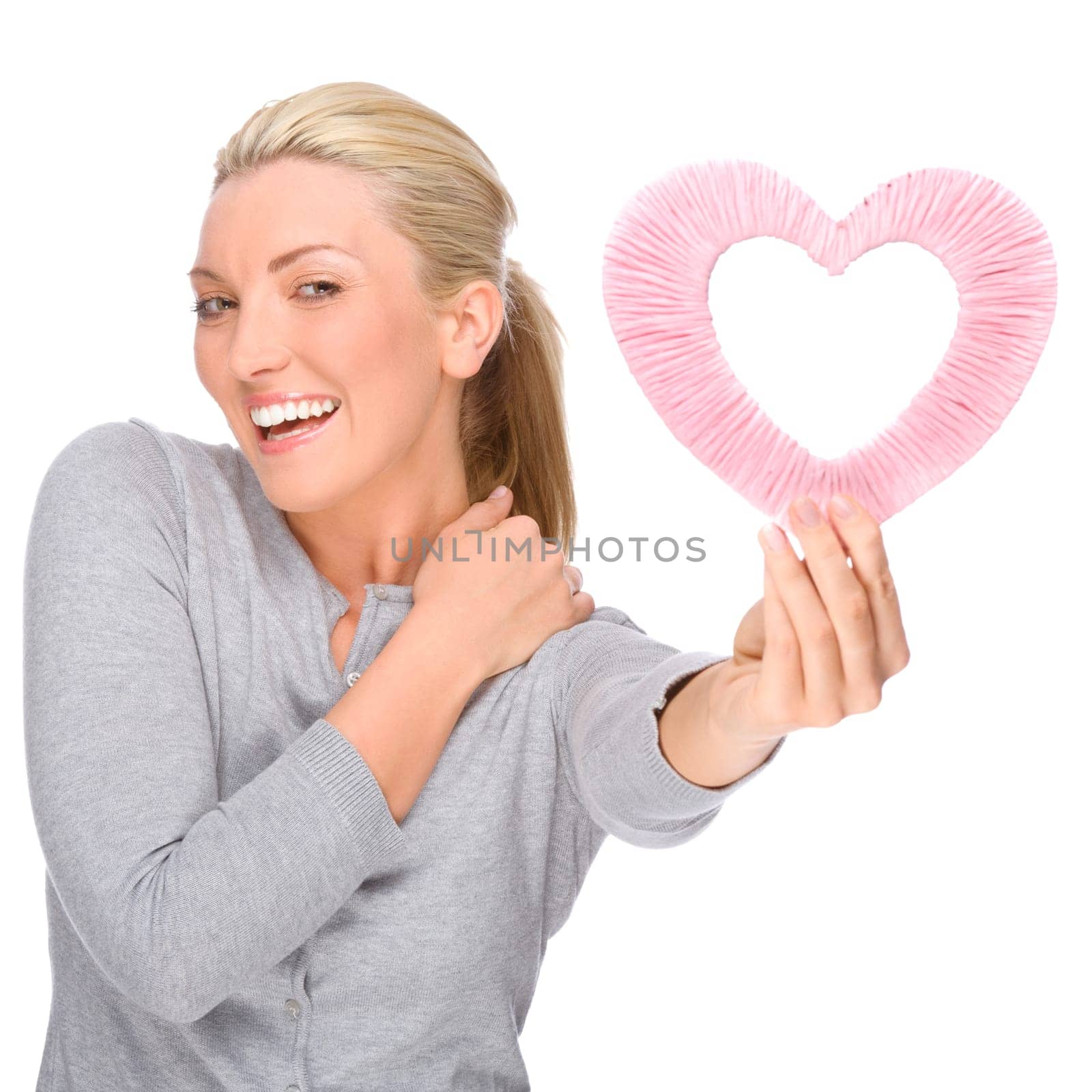 Studio shot of a young woman with a heart