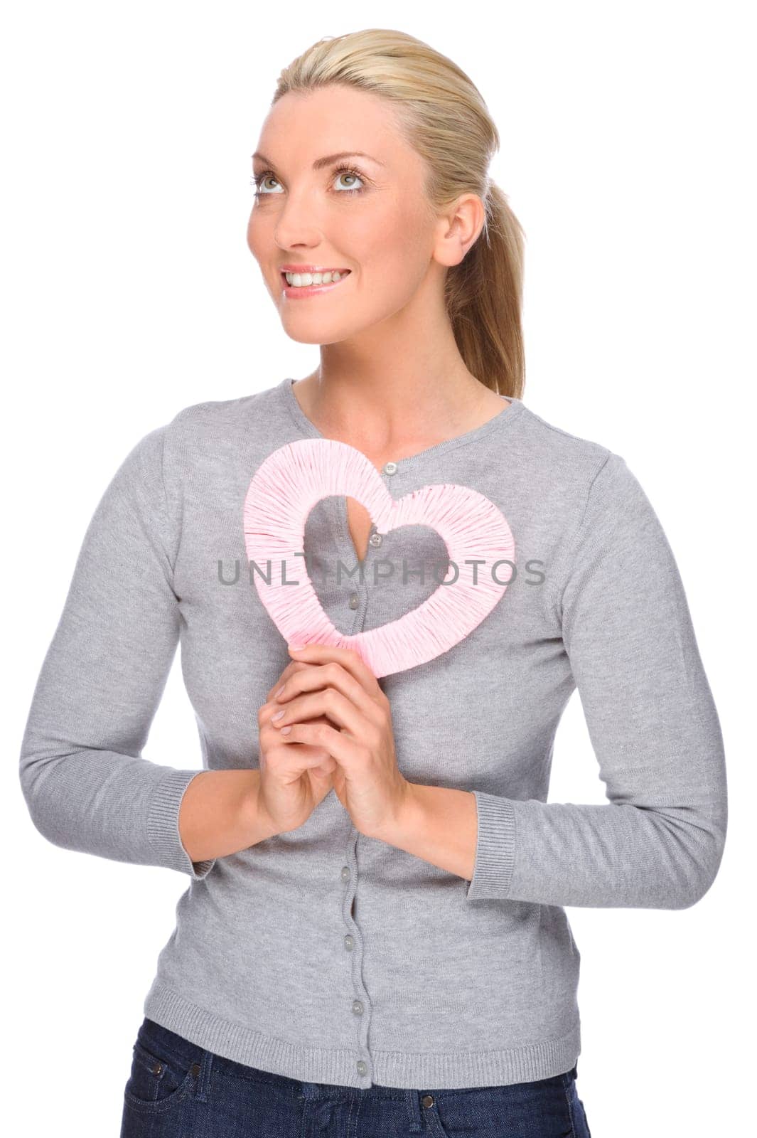 Studio shot of a young woman with a heart