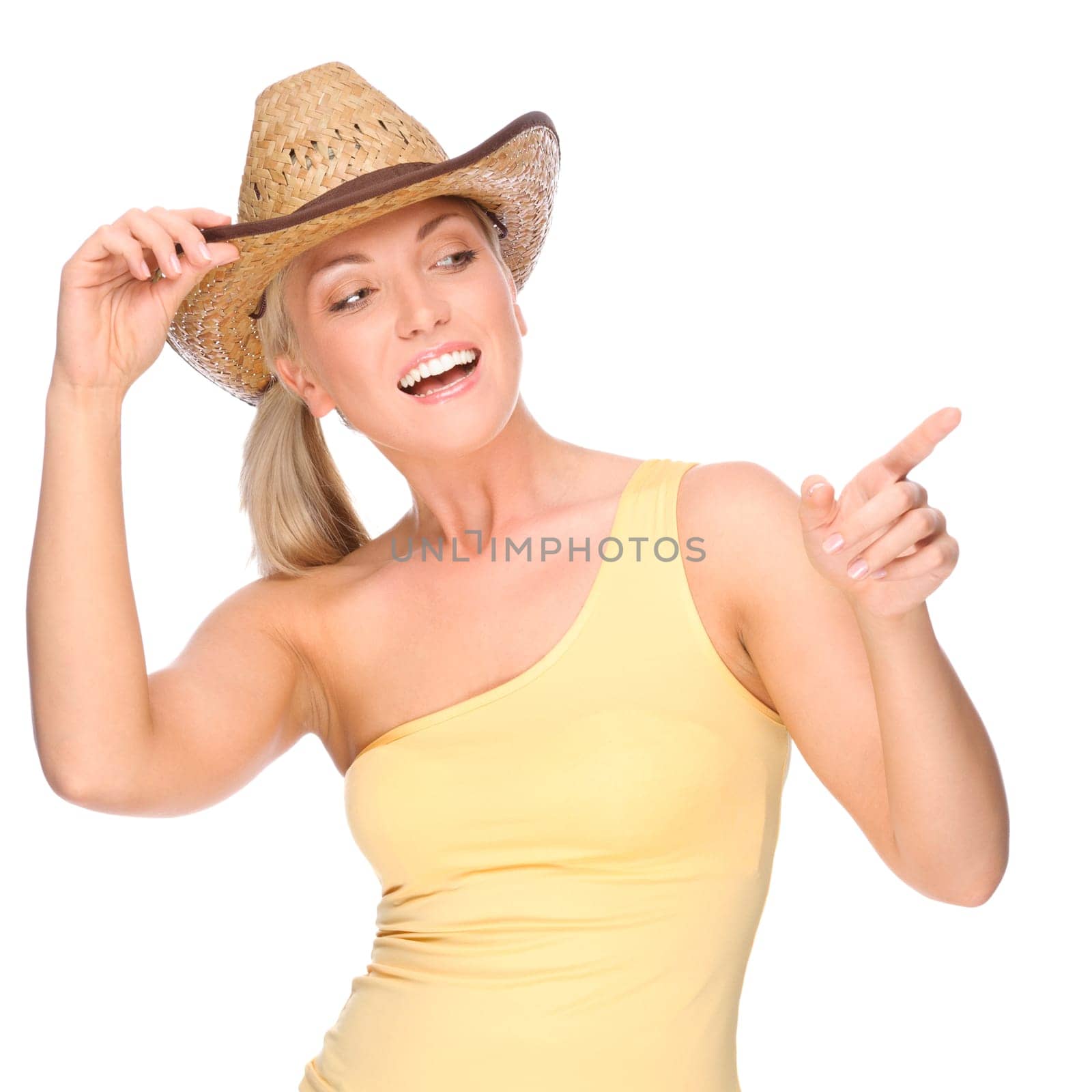 Studio shot of a young woman in a straw hat