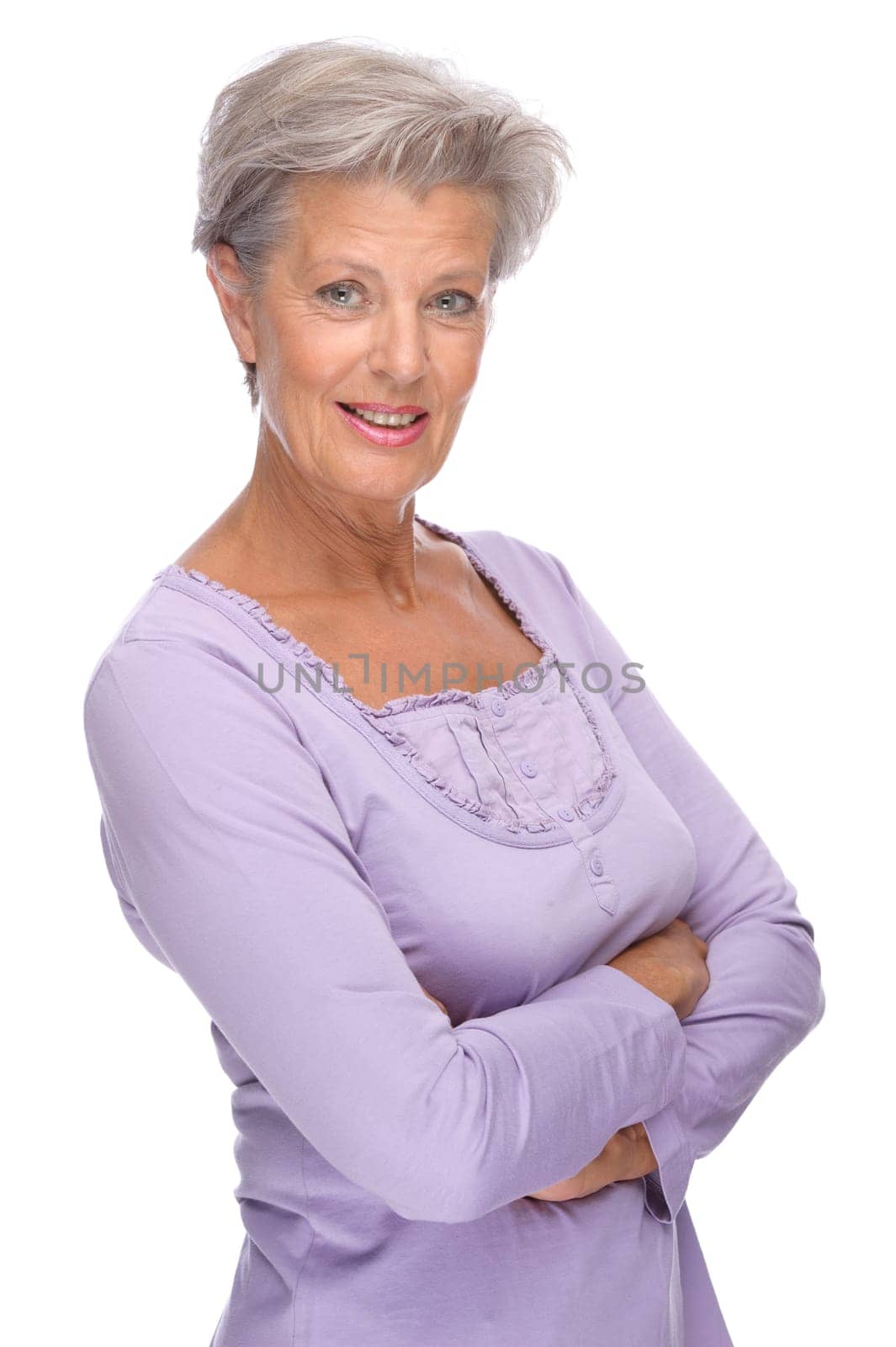 Studio shot of an active and happy senior woman