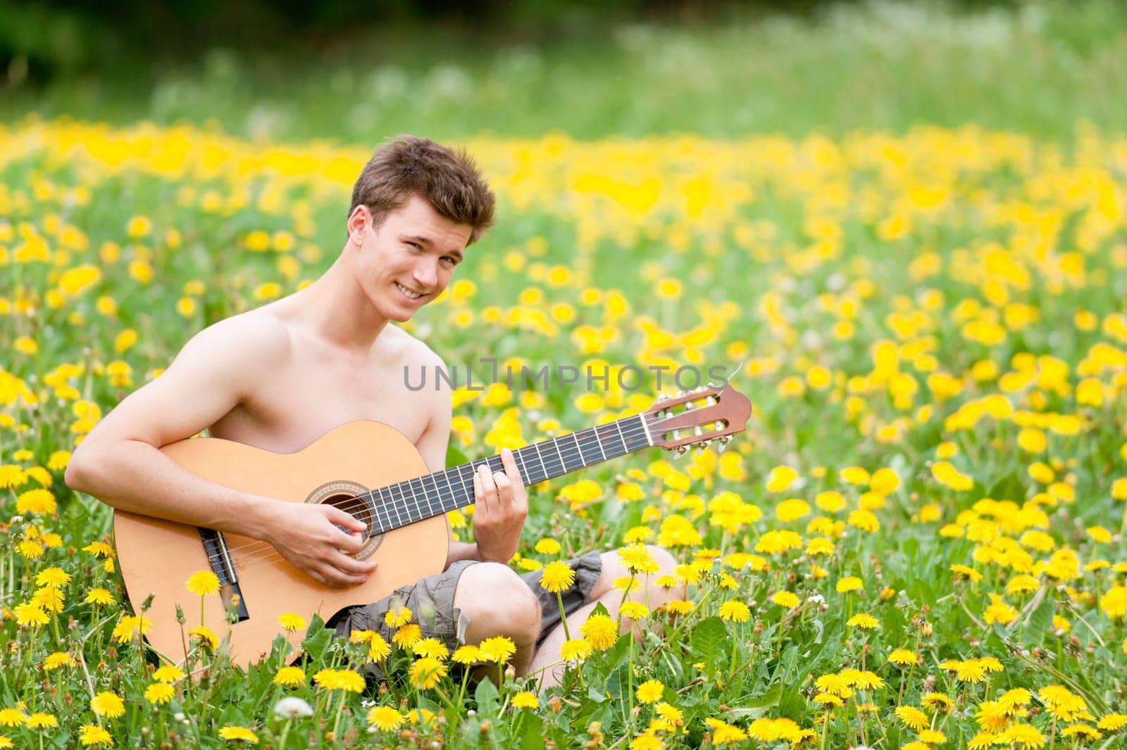 Young man with a guitar