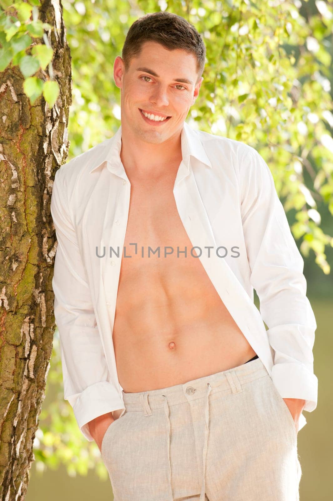 Fashion shot of a young and happy man