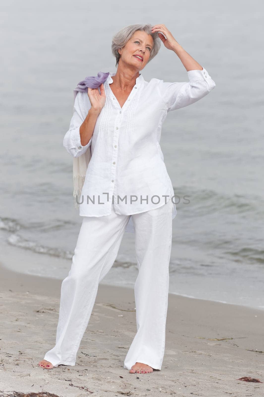 Active senior woman on the beach