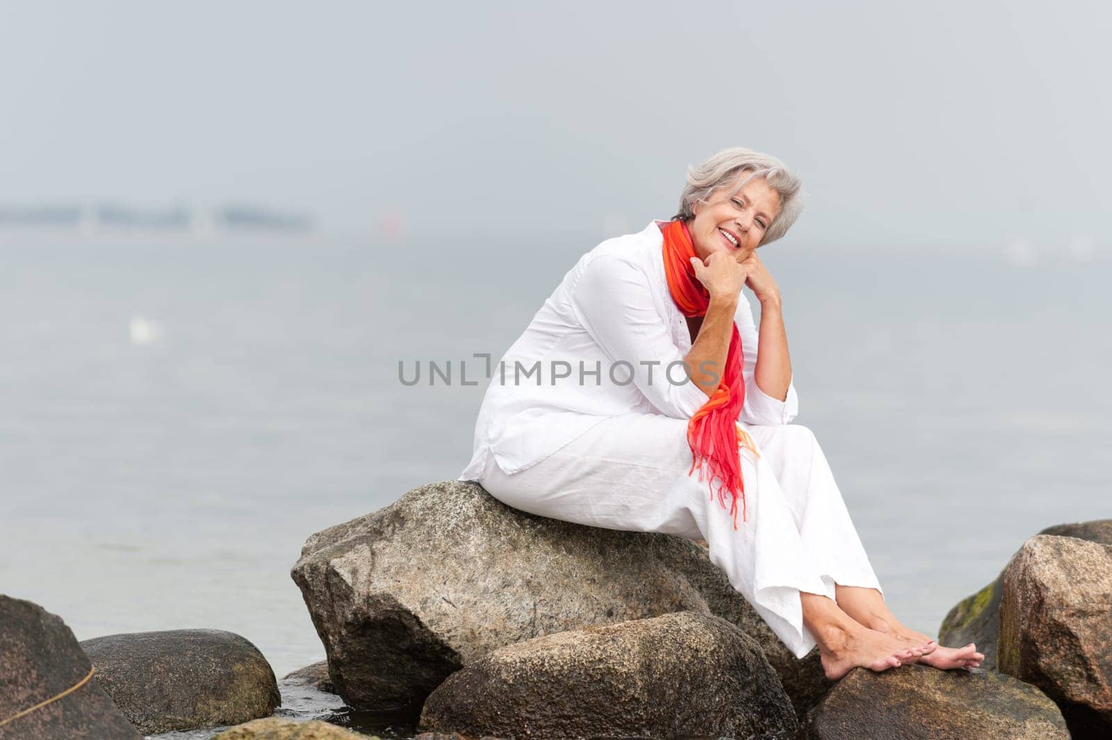 Active senior woman on the beach