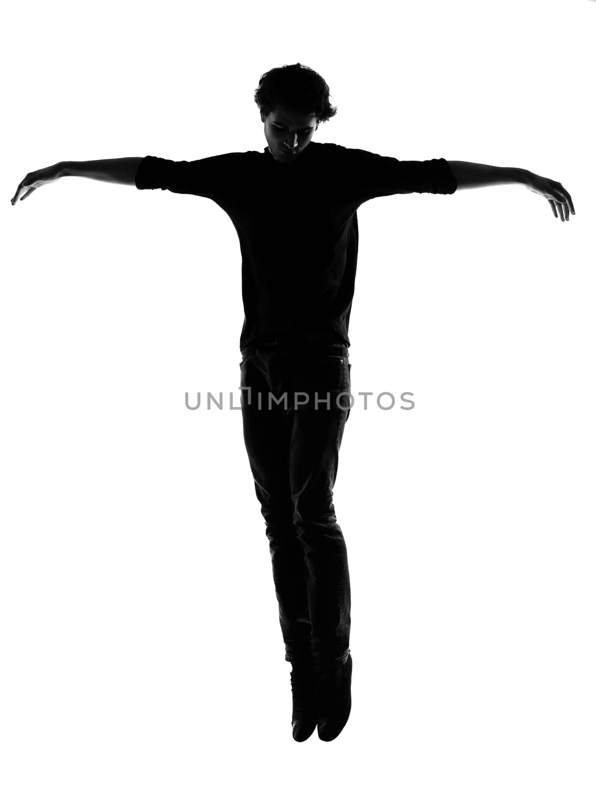 young man silhouette in studio isolated on white background