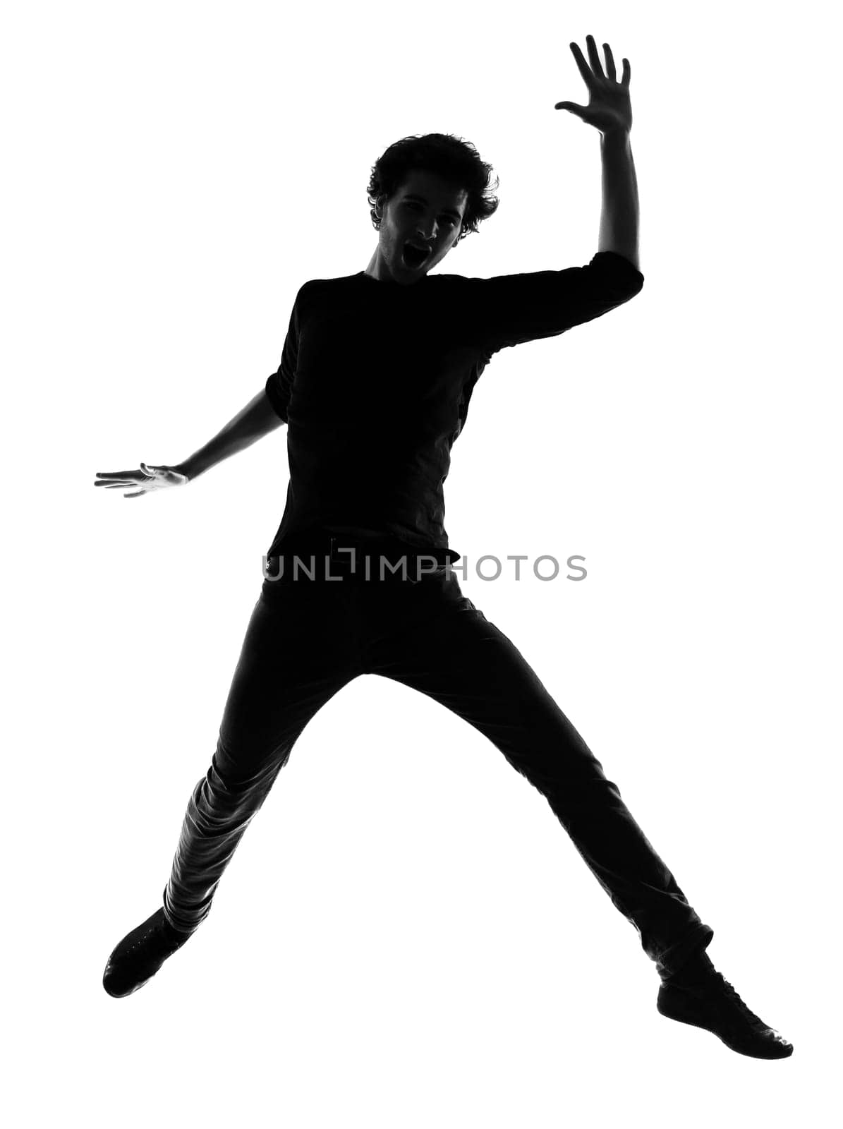 young man silhouette in studio isolated on white background