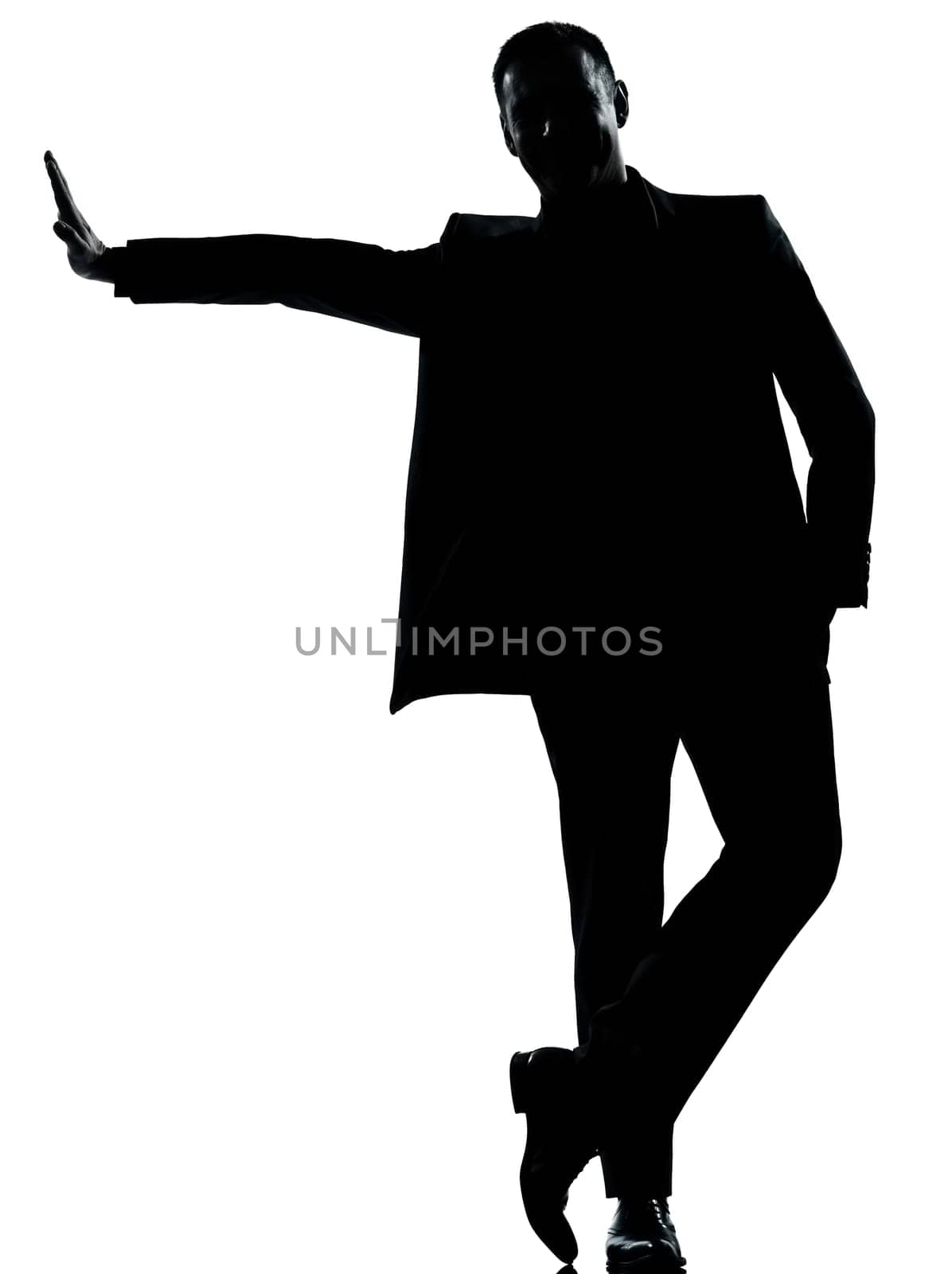 one caucasian business man silhouette standing Full length in studio isolated on white background