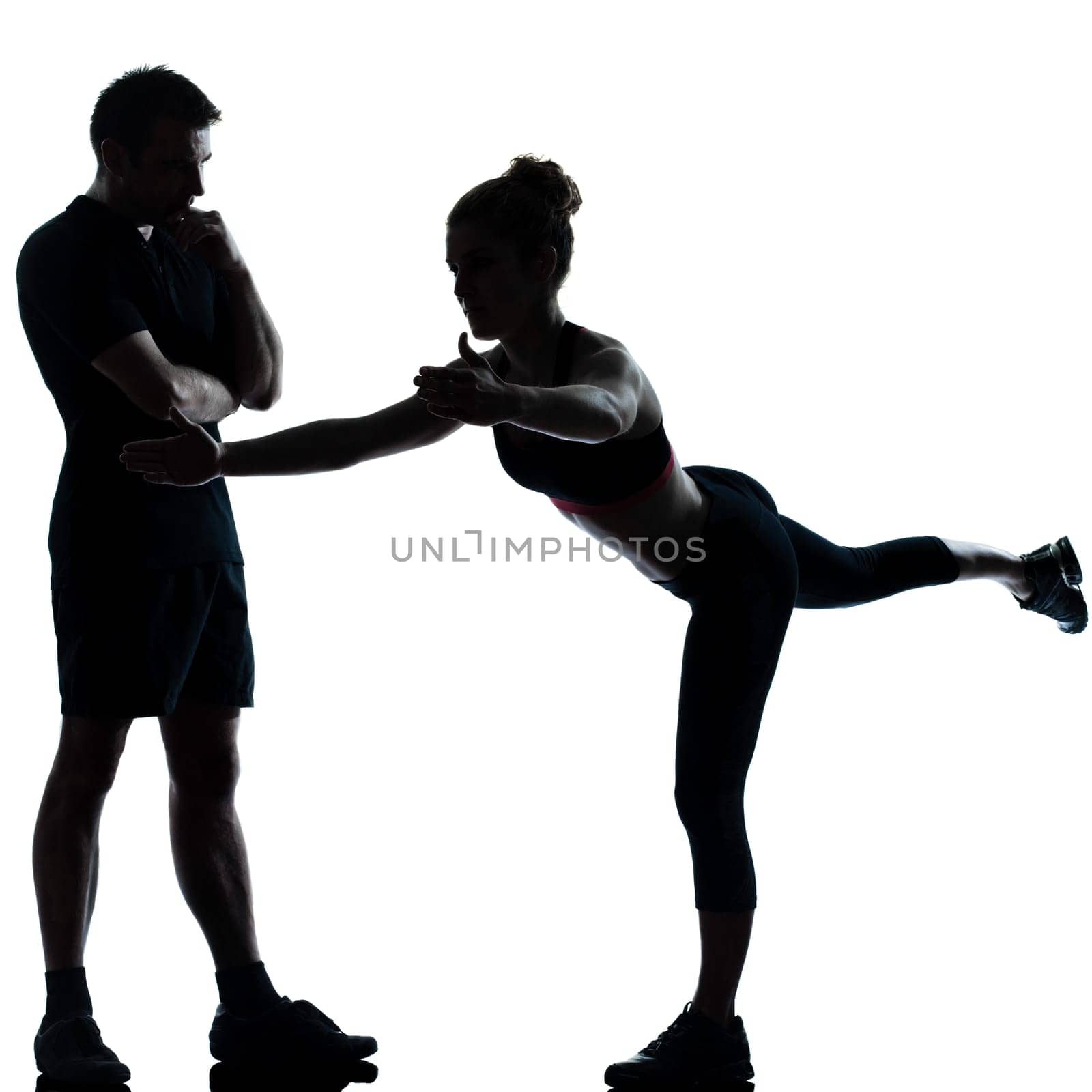 couple woman man exercising workout fitness aerobics posture in silhouette studio isolated on white background