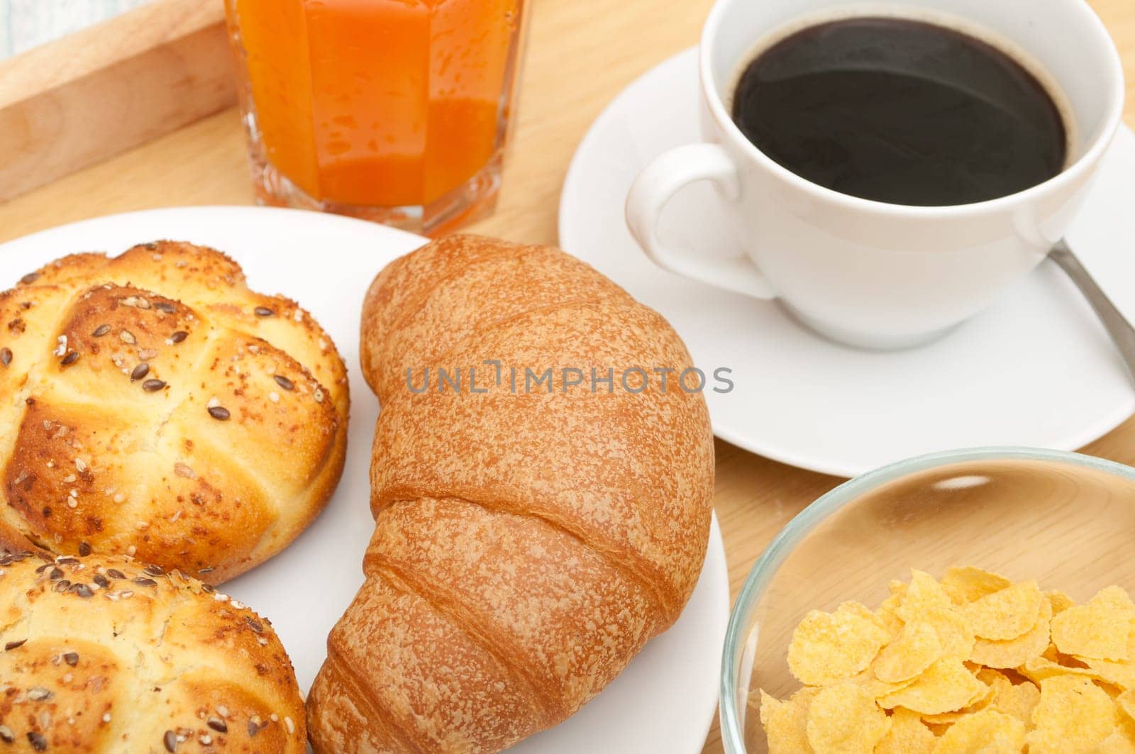 Breakfast in Bed - Corn Flakes, Coffee, Croissant, Orange Juice, Coffee and Rolls