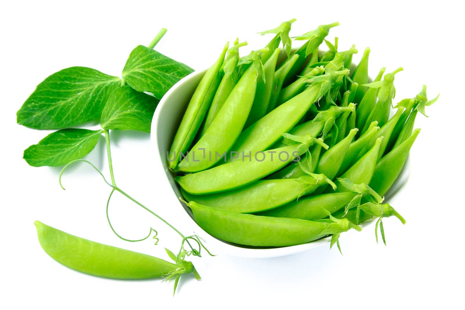 Sugar snap peas against white background