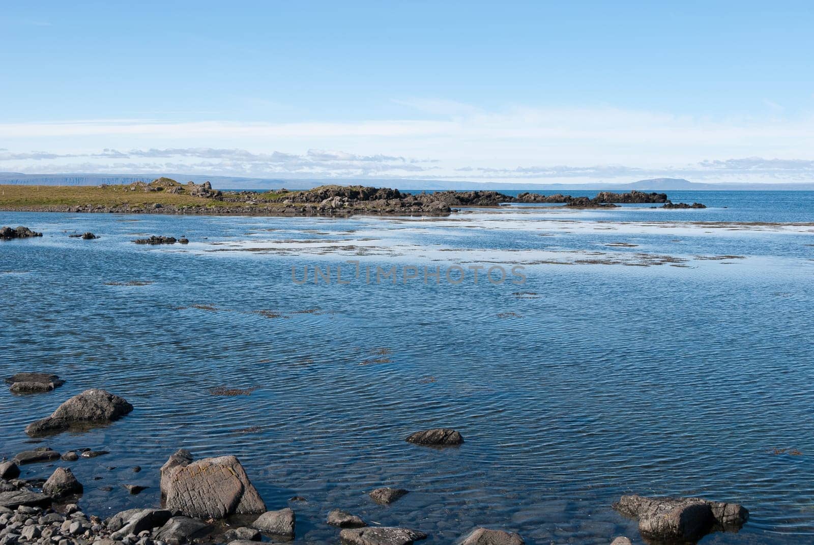 sea and rocks on the vatnsness peninsula in Iceland
