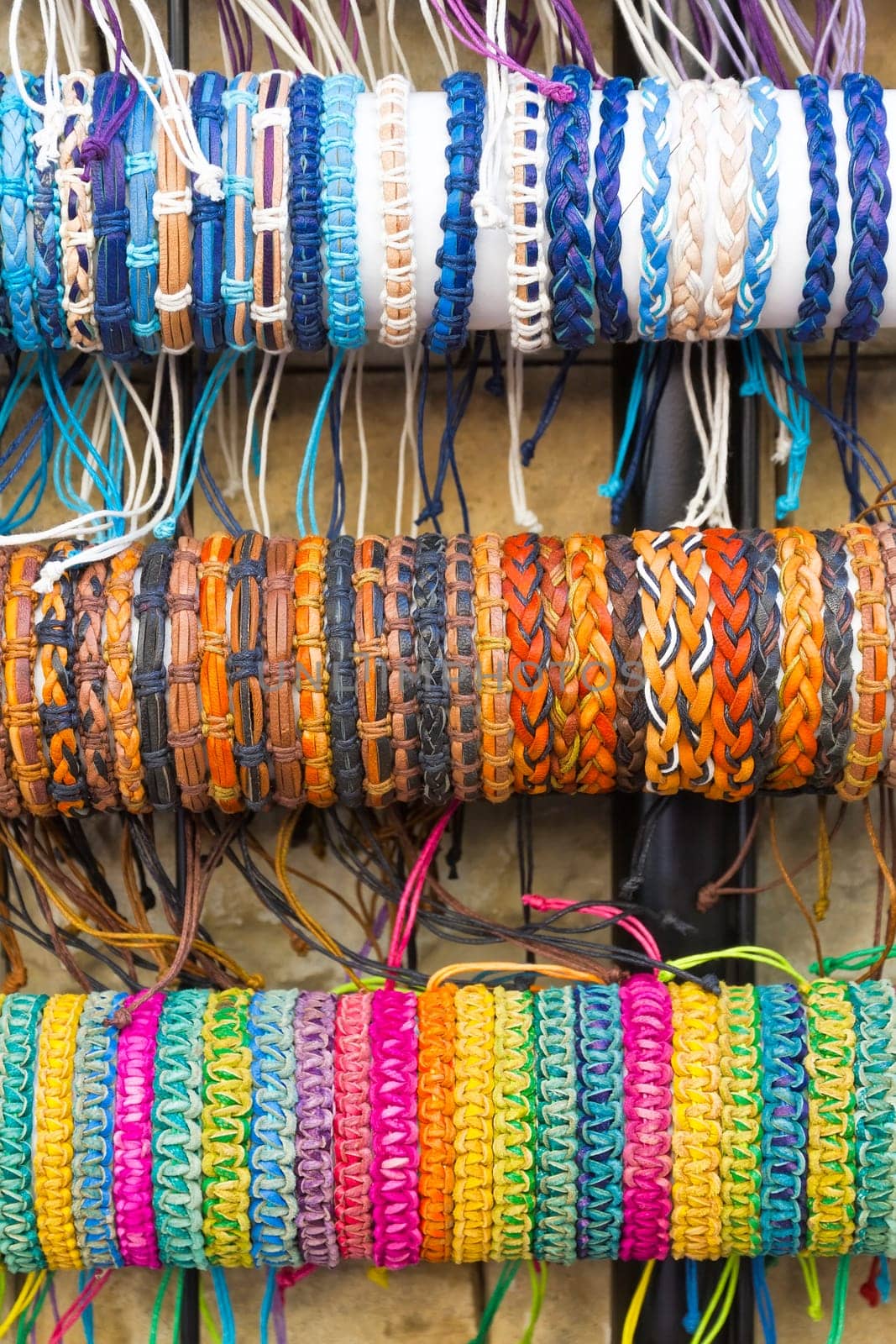 Background created from stacks of colorful bangles with tones.