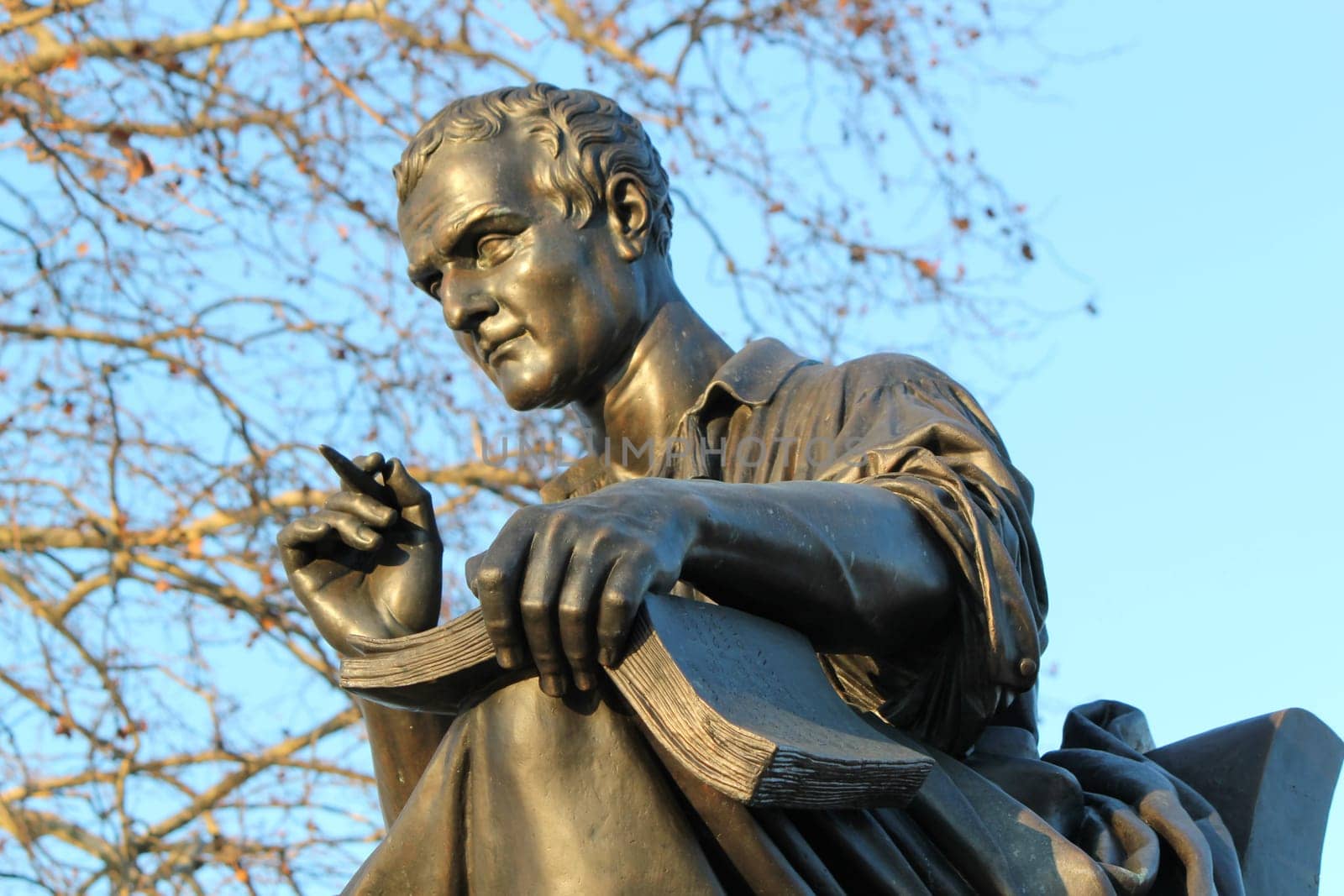 Close up of the statue of Jean-Jacques Rousseau on the Rousseau island, Geneva, Switzerland. This sculpture was created by James Pradier sculptor in 1835.