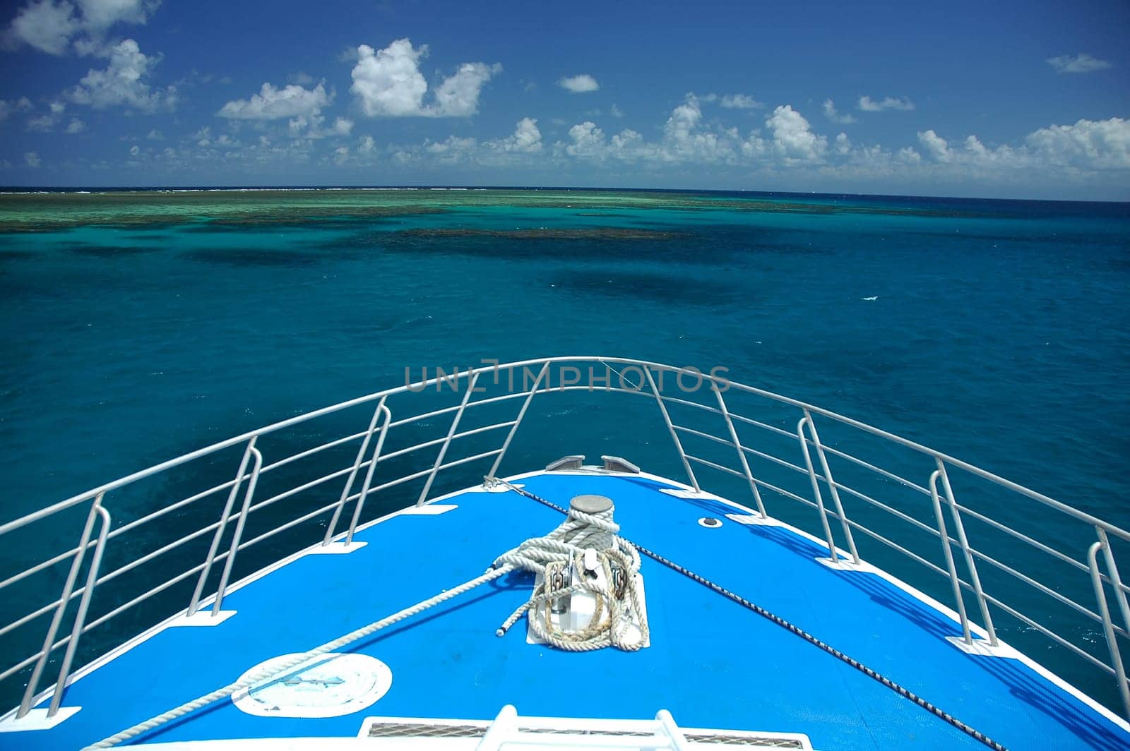 bow of a blue ship, great barrier reef near Cairns, Australia