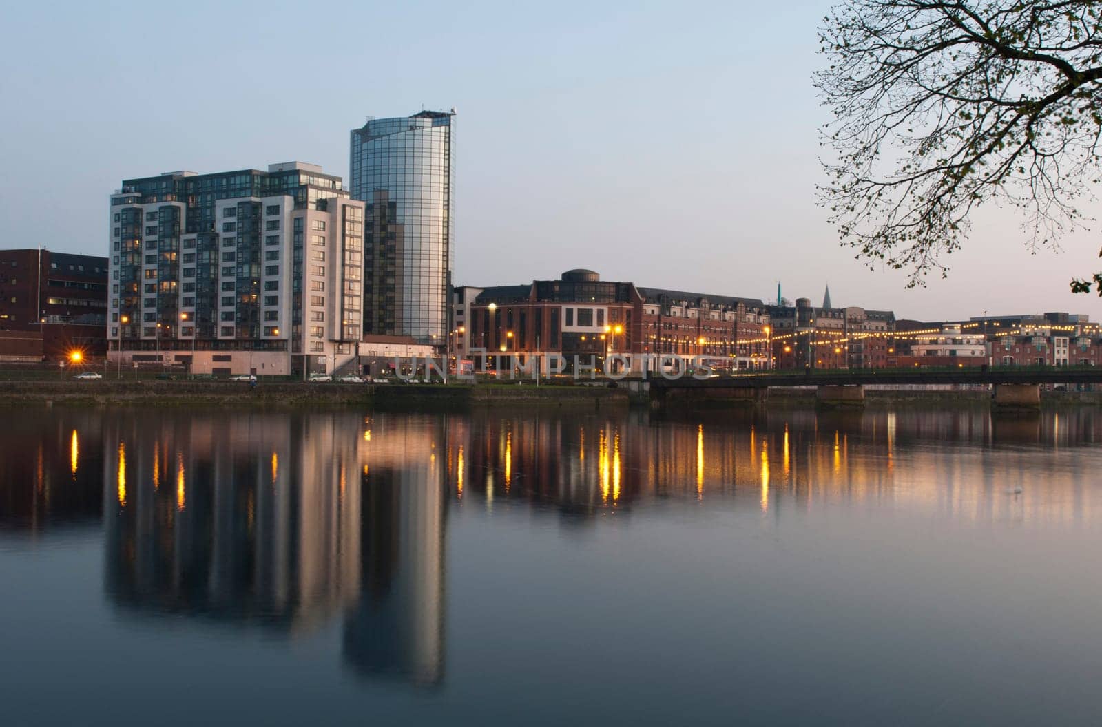 stunning nightscene with Riverpoint buildings and Shannon bridge (over Shannon river) in Limerick, Ireland (picture taken after sunset)