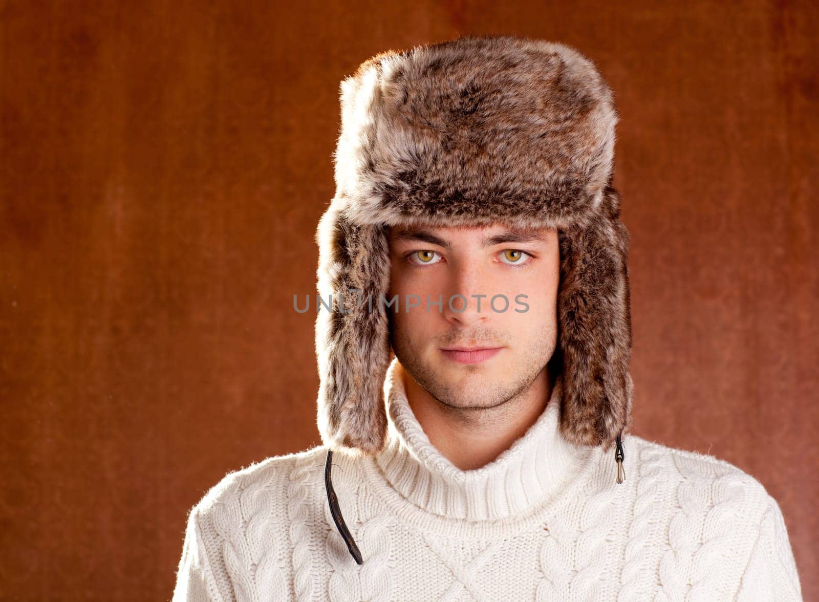autumn winter man with brown fur  hat portrait