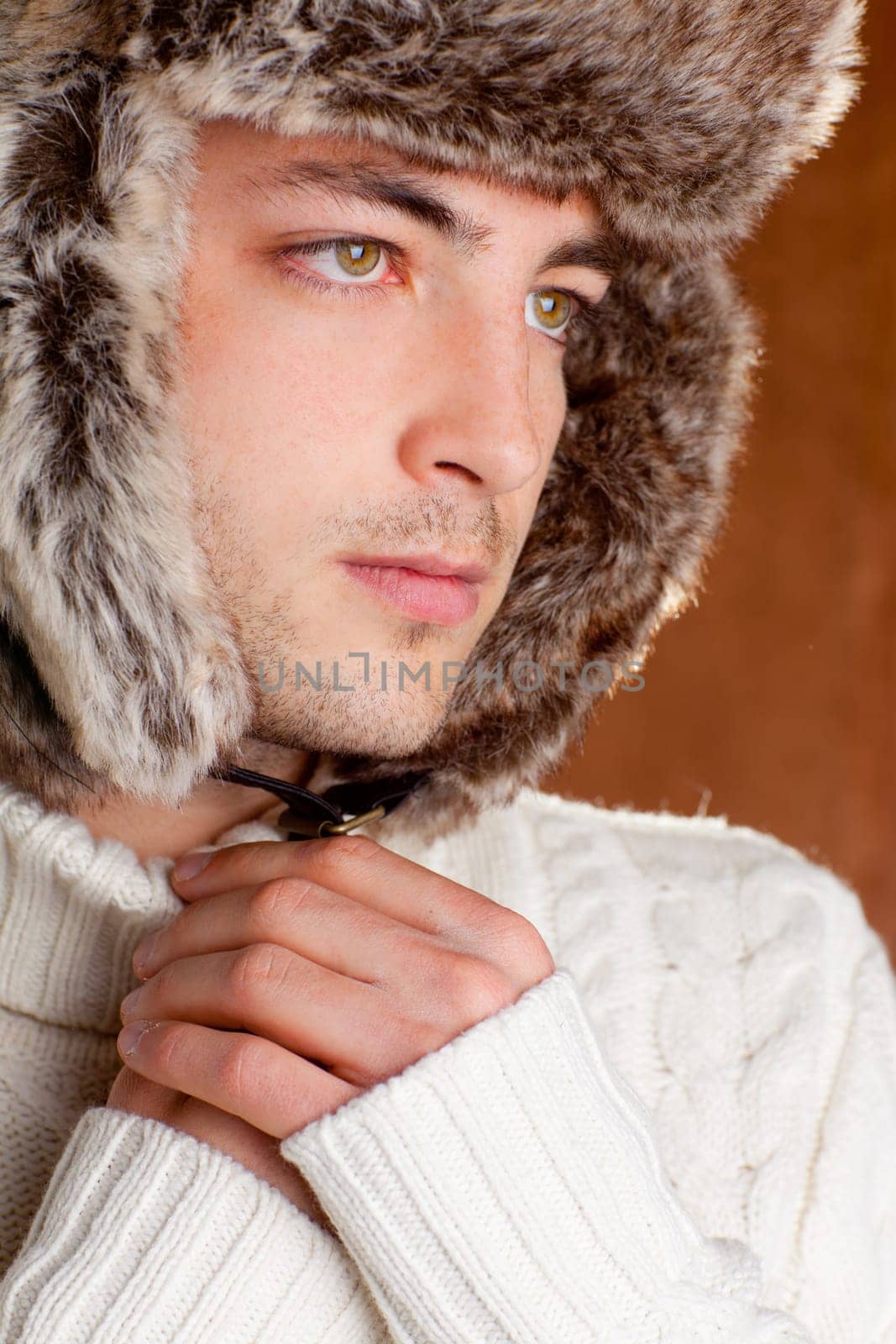 autumn winter man with brown fur  hat portrait