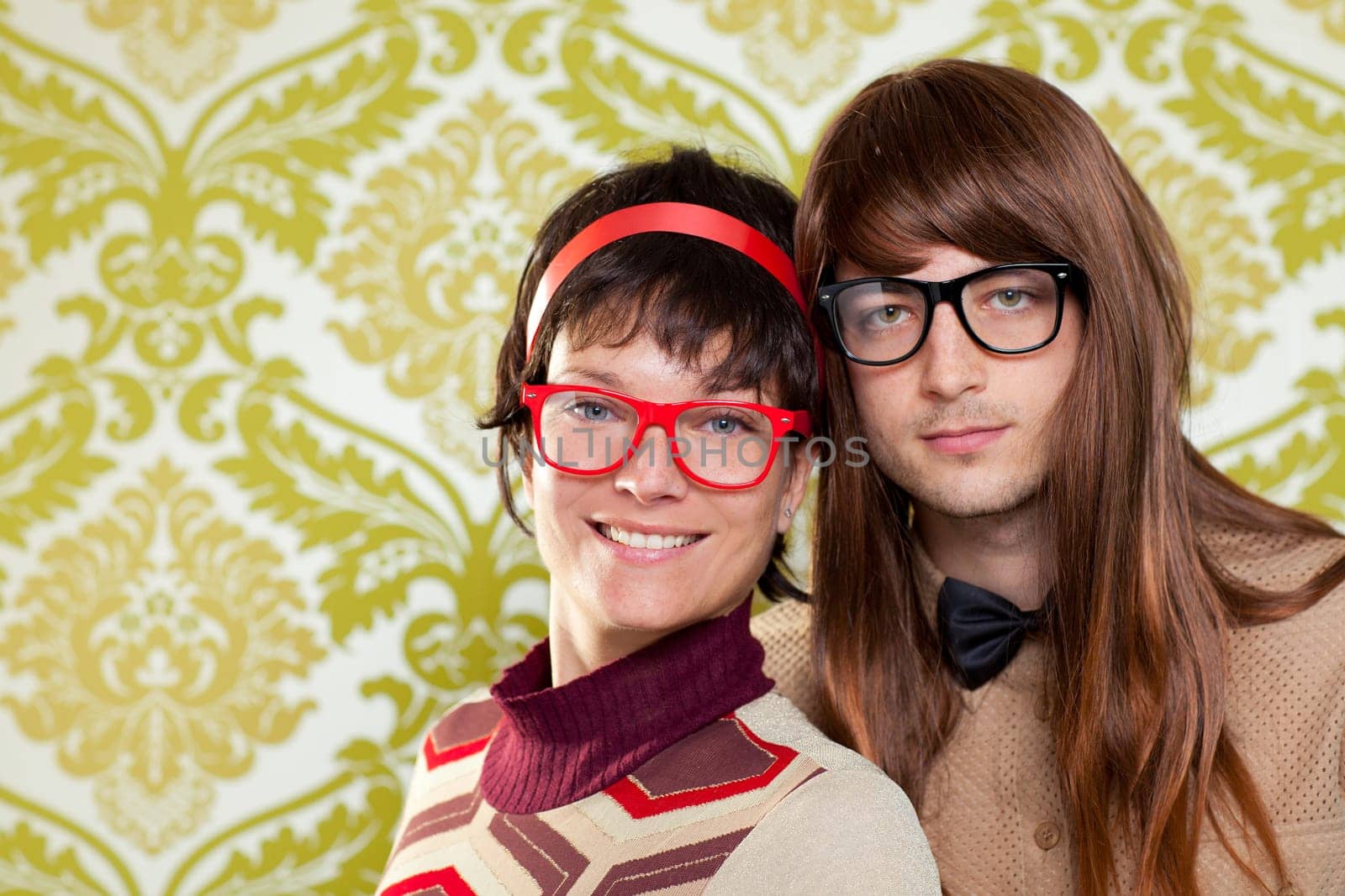 Funny humor silly nerd couple on retro vintage wallpaper background