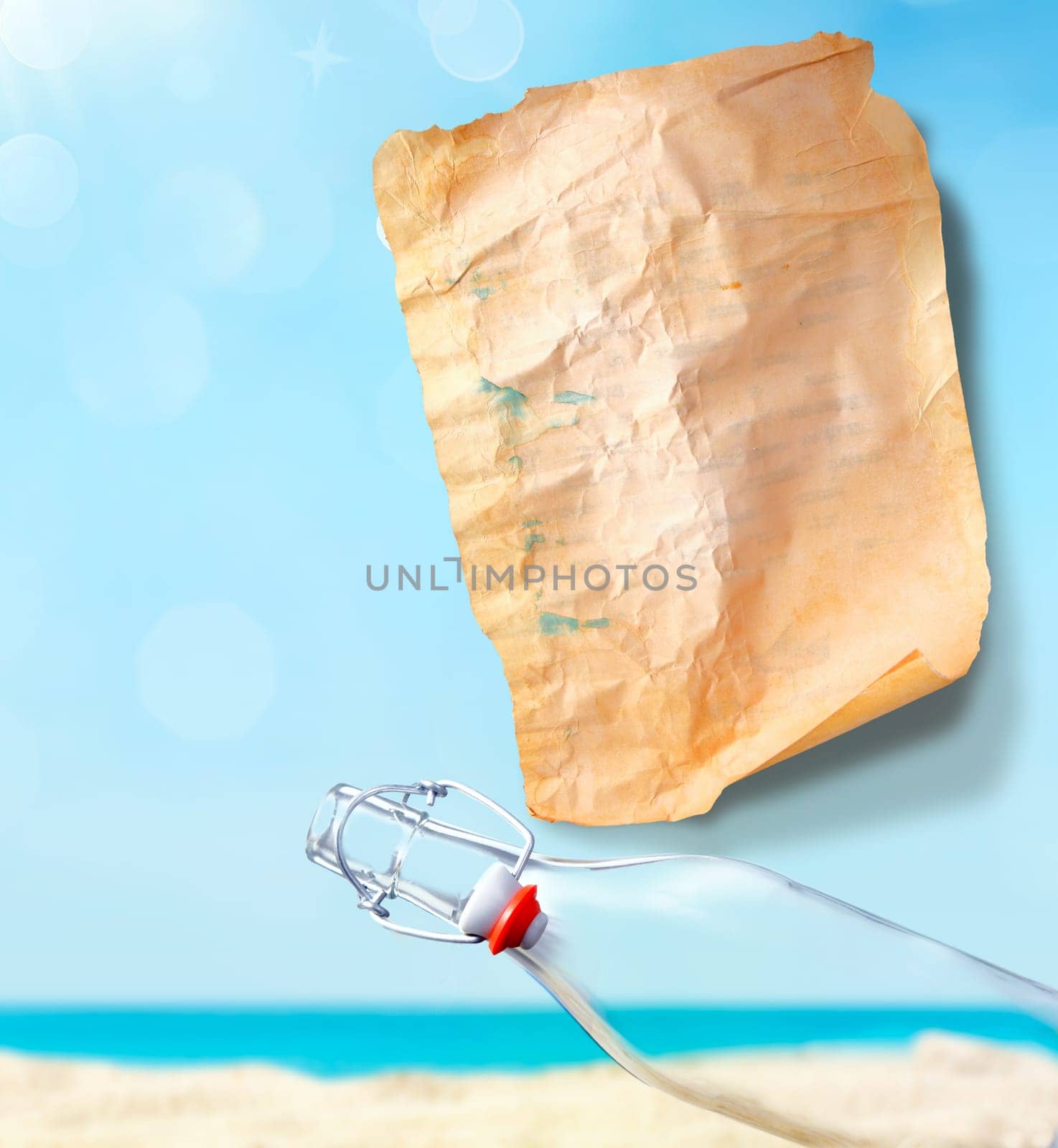 Empty Message Paper with an empty bottle with a sky background on a sandy beach