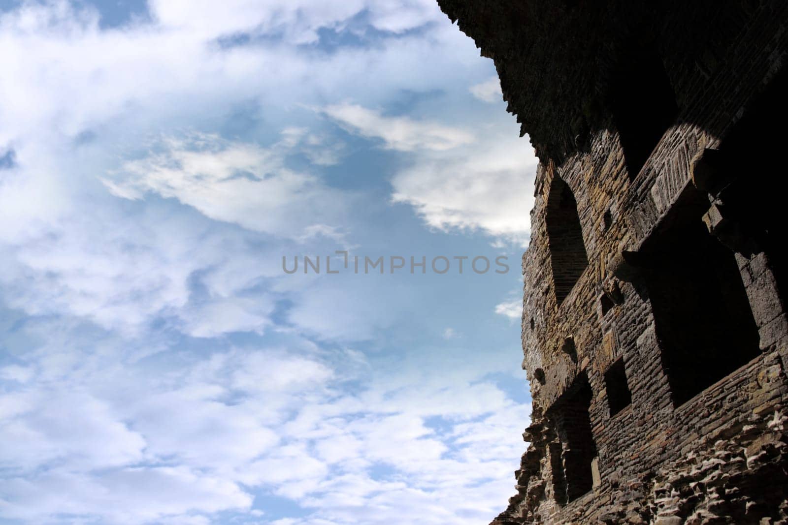 Ruins of a five-storeyed rectangular towerhouse within a bawn Partly destroyed in the 17th century in Ballylongford county kerry ireland from the inside