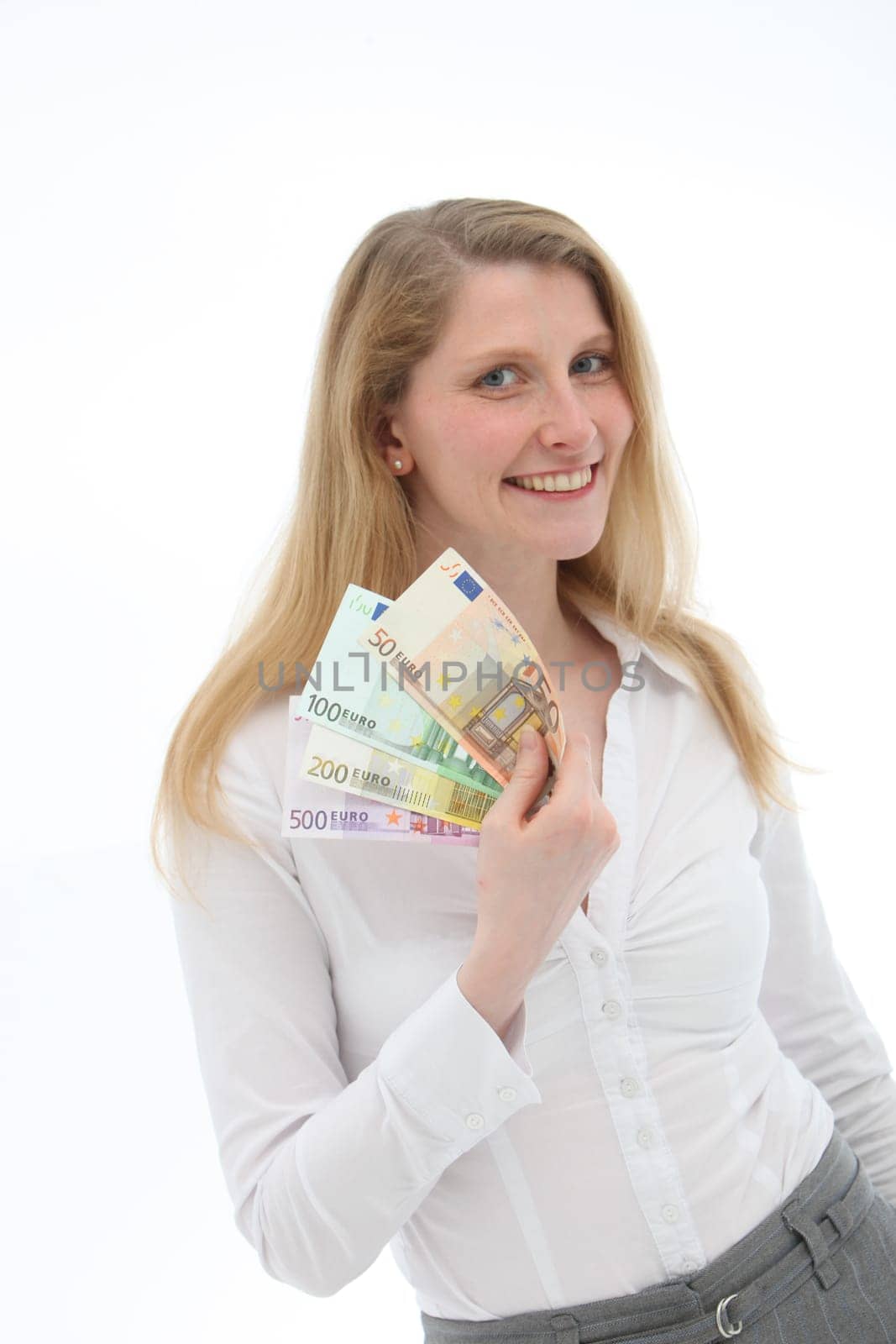Young woman holding a lot of money in her hand and smiling -clipping with text space
