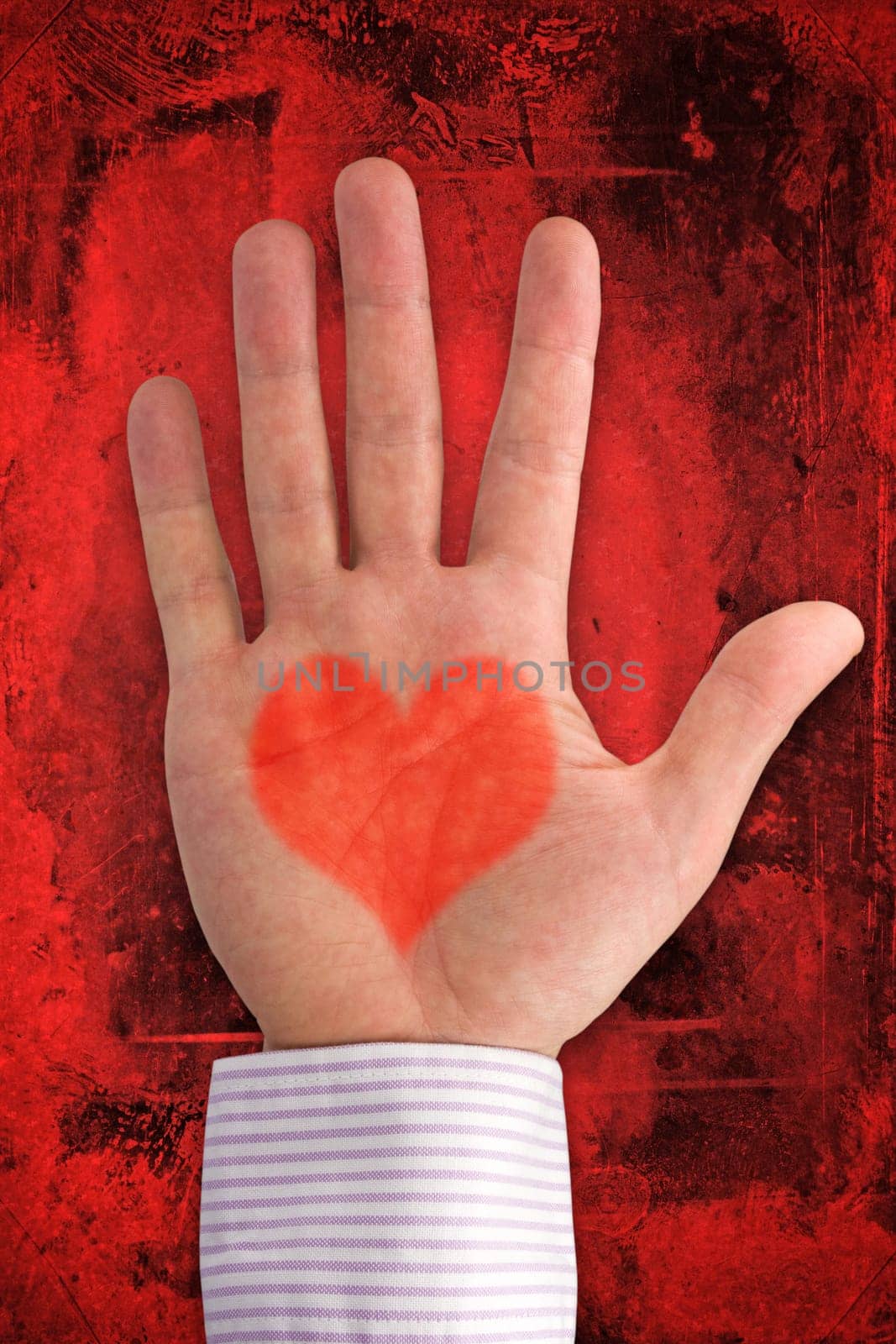 love concept. hand with heart shape on dark red background