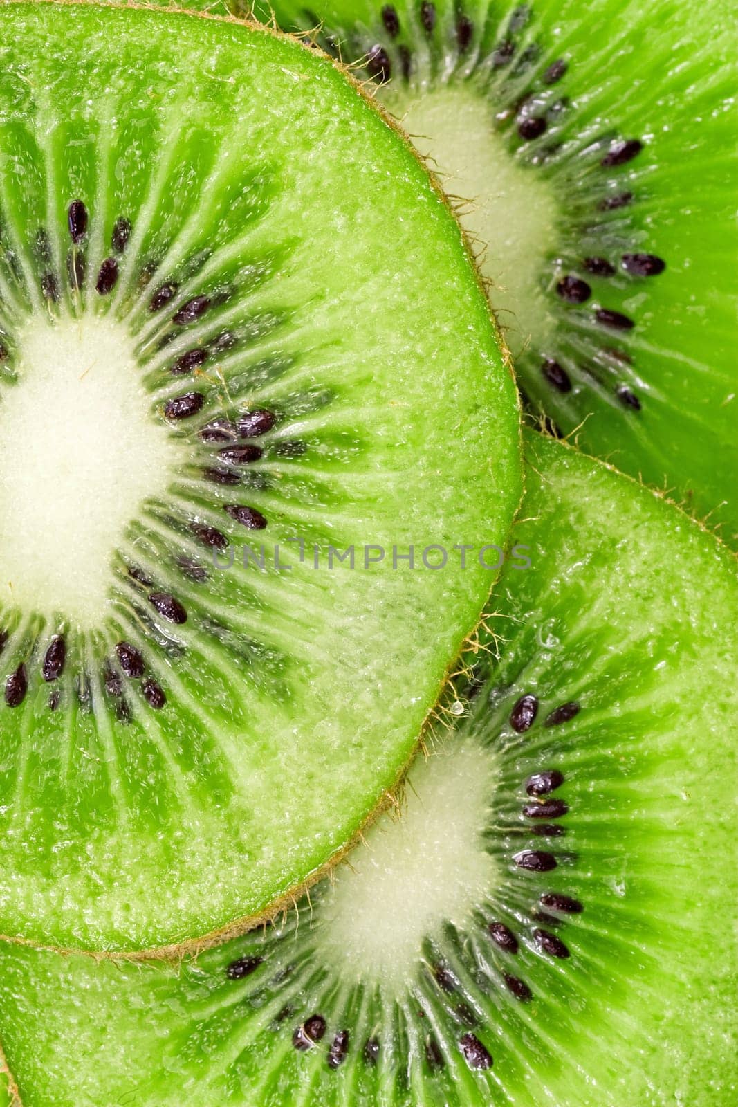 close up slices of juicy kiwi fruit