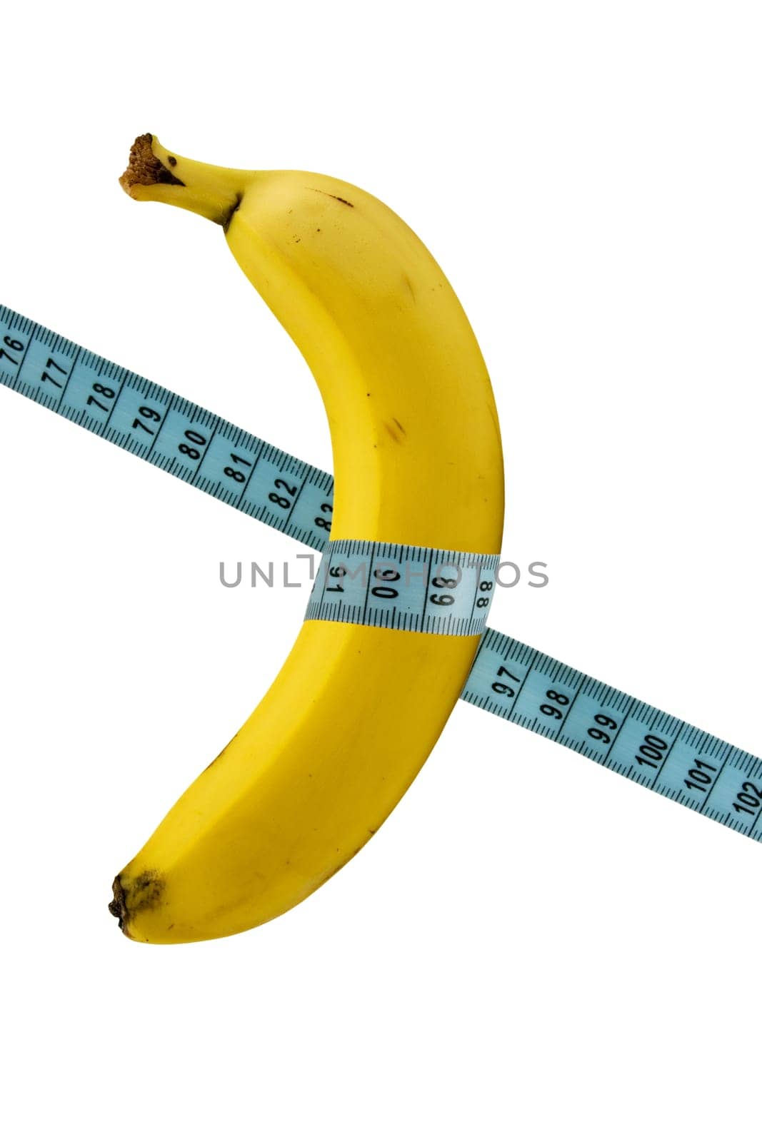 health and nutrition. banana with measure tape