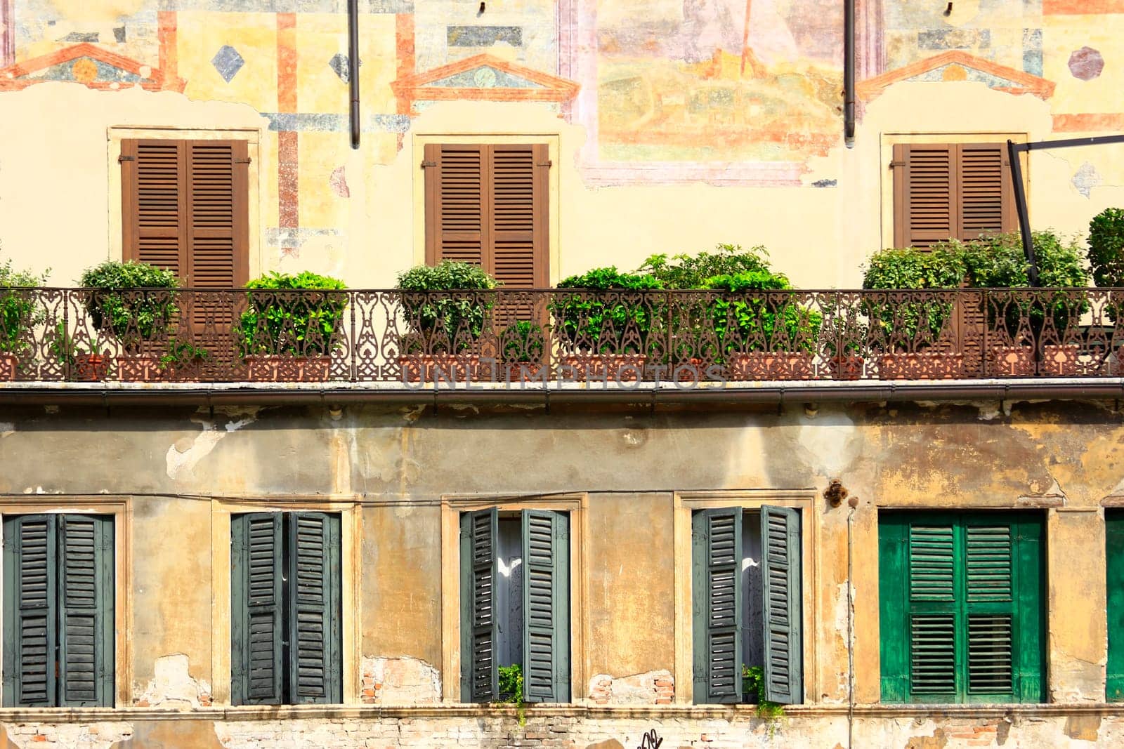picturesque,painted facades at Piazza delle Erbe,Verona,Italy