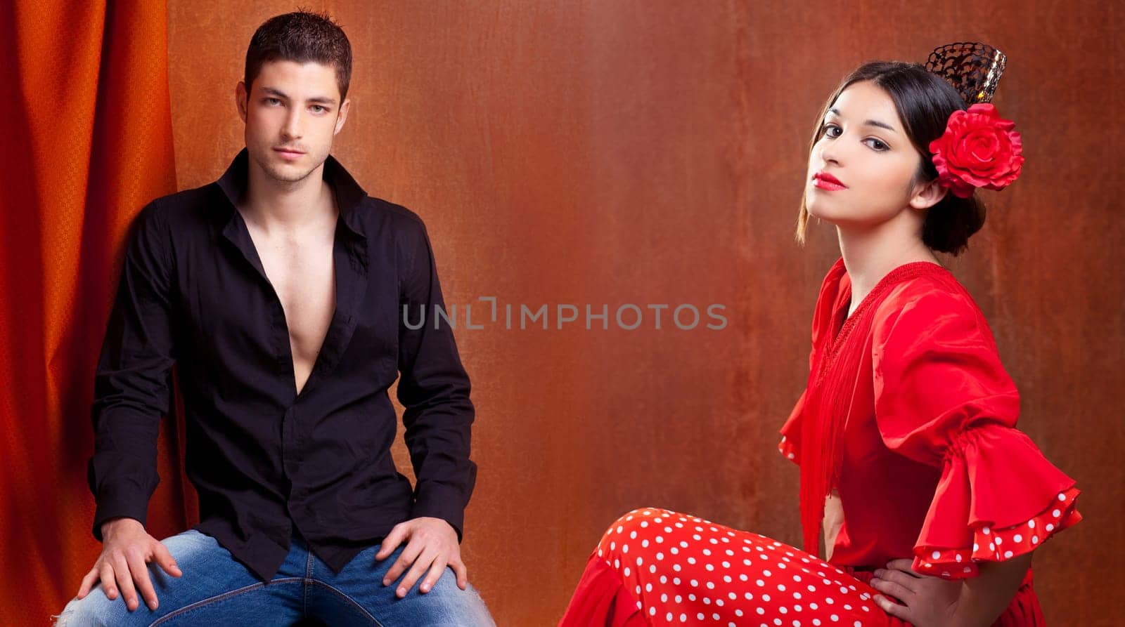 Gipsy flamenco dancer couple from Spain with red rose and spanish back comb peineta