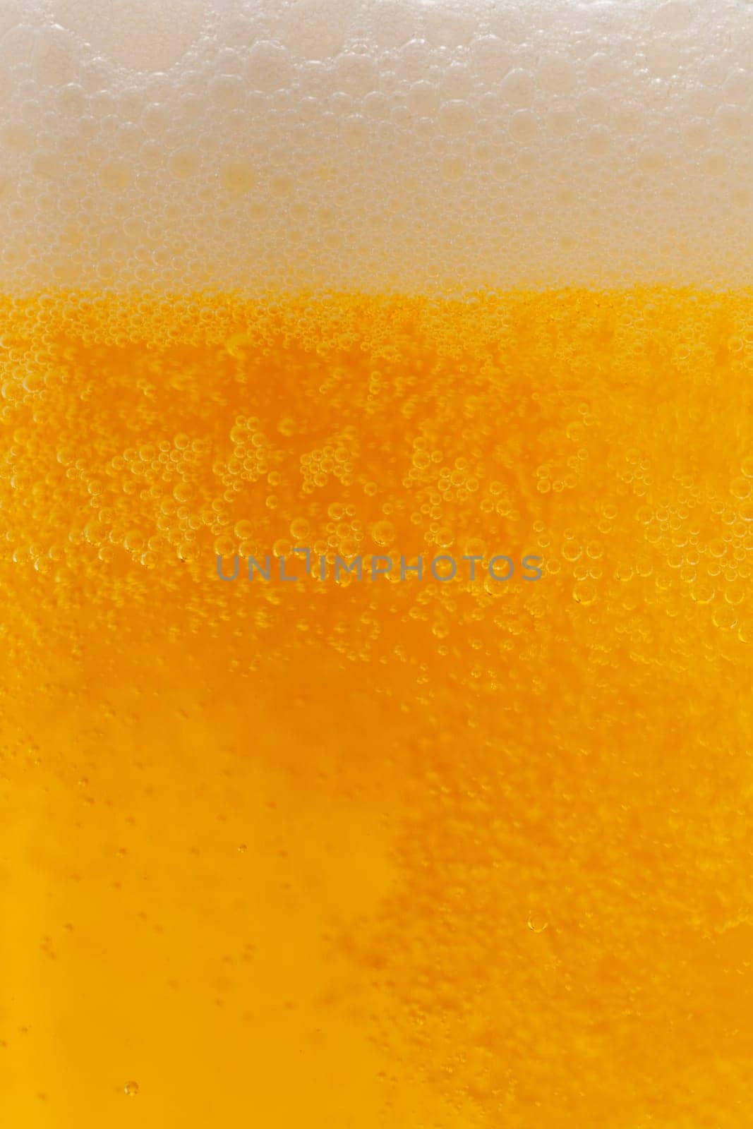 cold beer,close-up with foam and bubbles