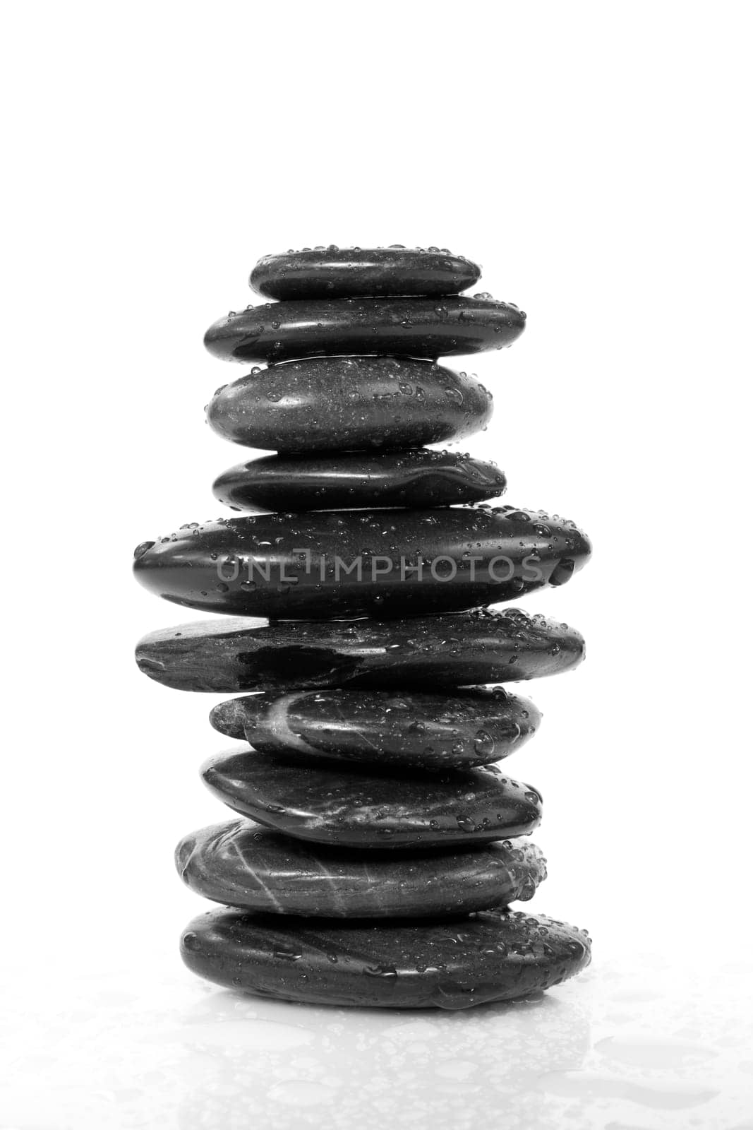stability and balance. tower of wet pebbles.