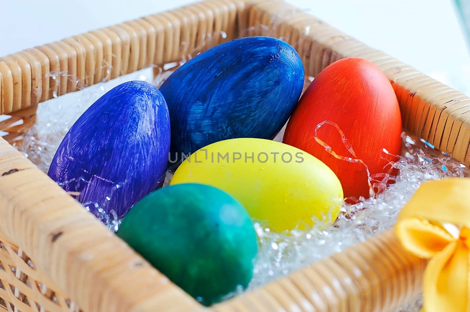 bunch of painted Easter Eggs in a basket
