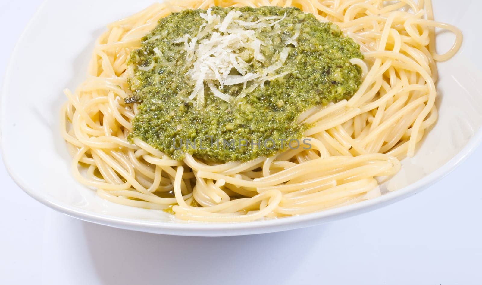 Pasta with pesto on white background, Genovese recipe