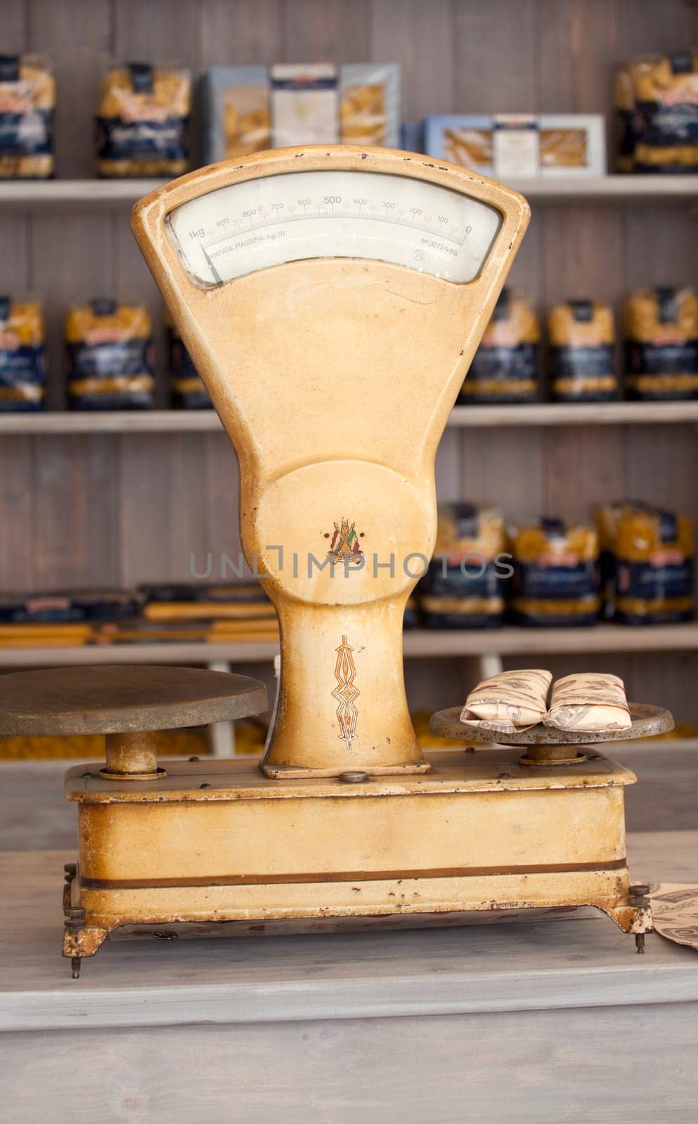 Vintage kitchen scales, Italian pasta on the background